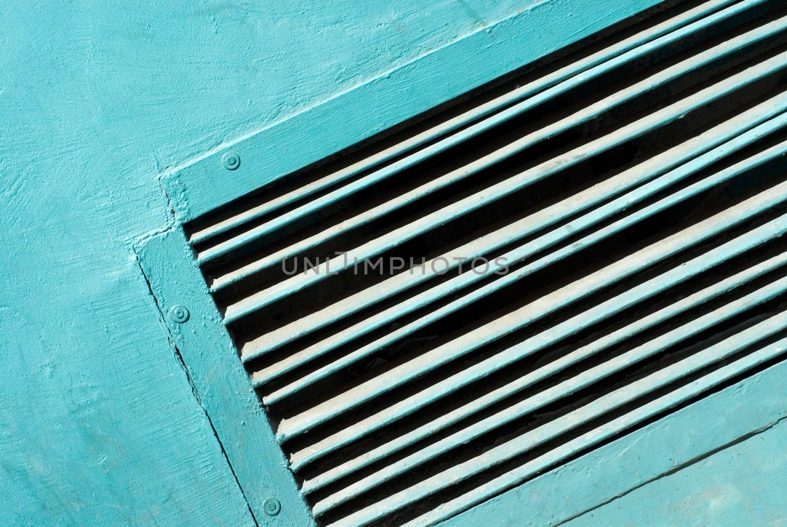 Close-up of an air duct on a wall