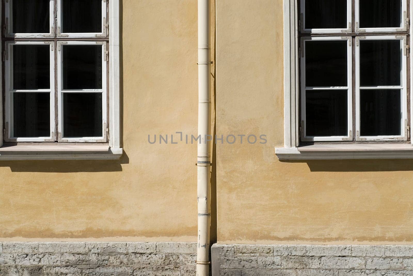 Close-up of a pipe mounted on a wall