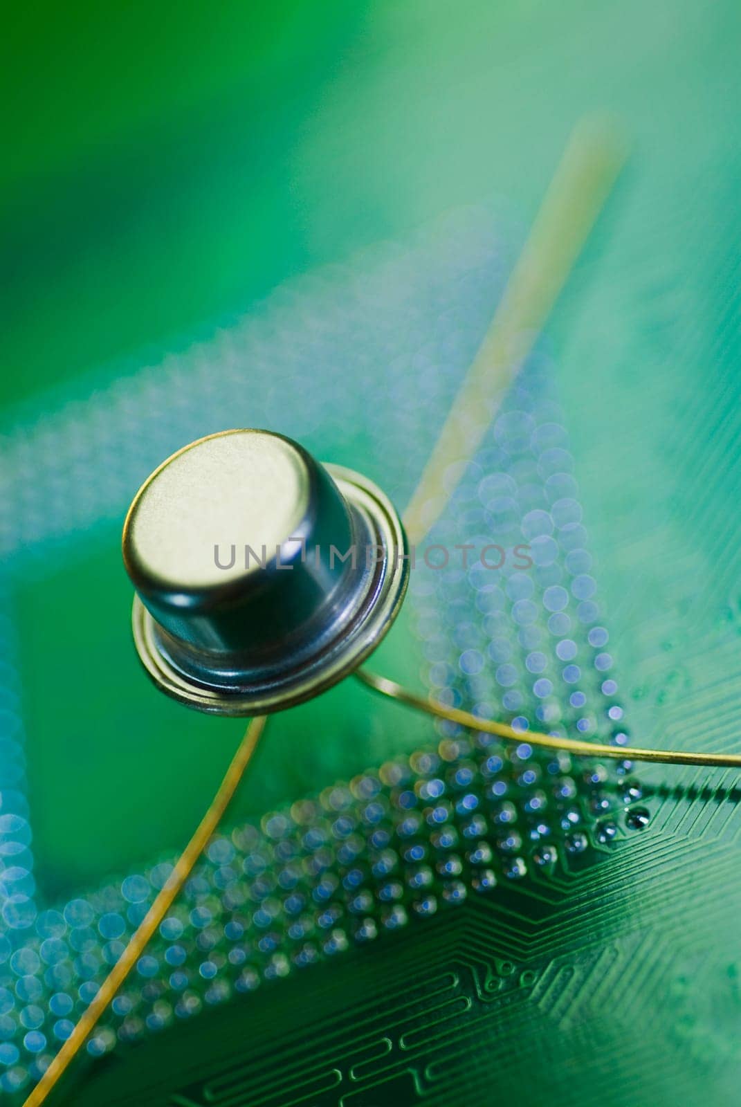 Close_up of a transistor on a mother board