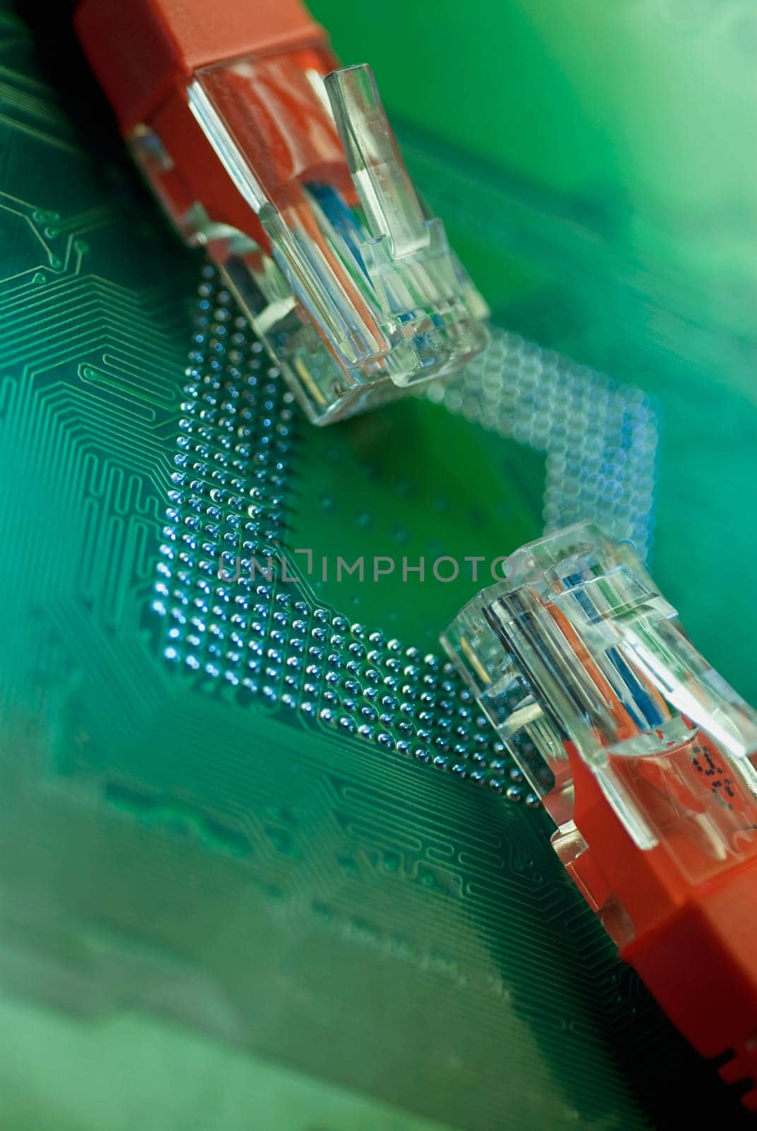 Close_up of two computer cables on a mother board