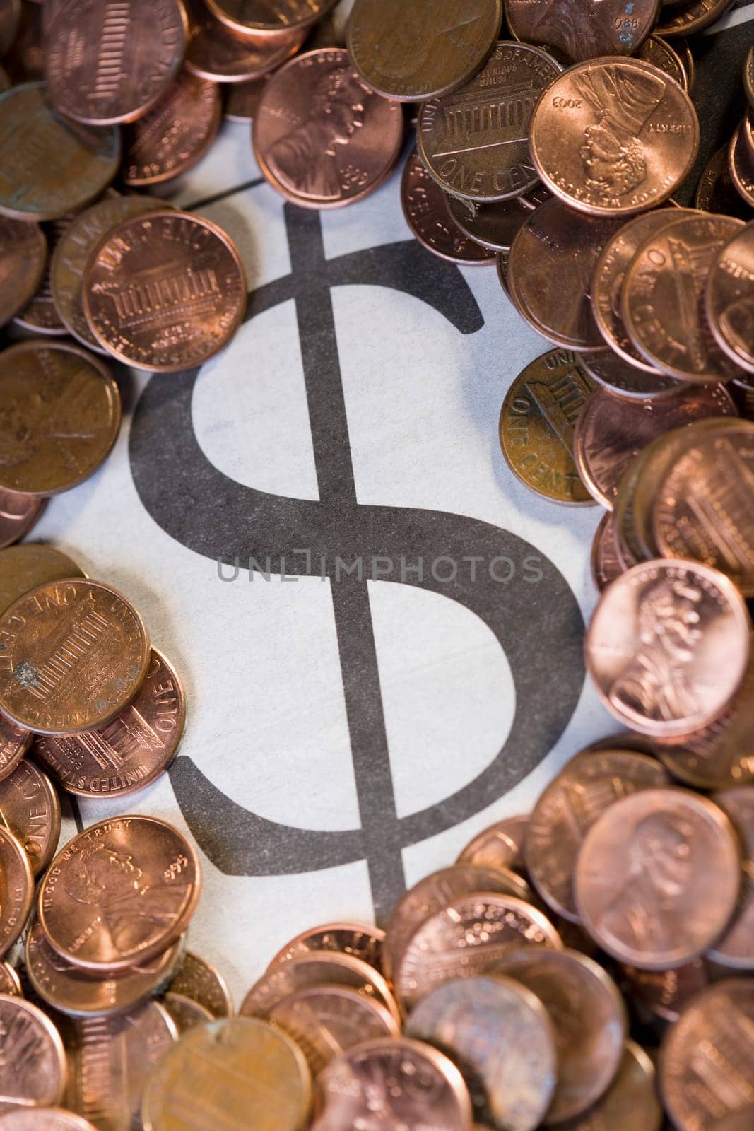 Close_up of coins with dollar sign