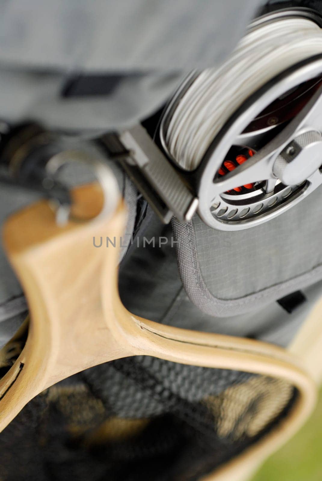 Close-up of a fishing net and a fishing reel