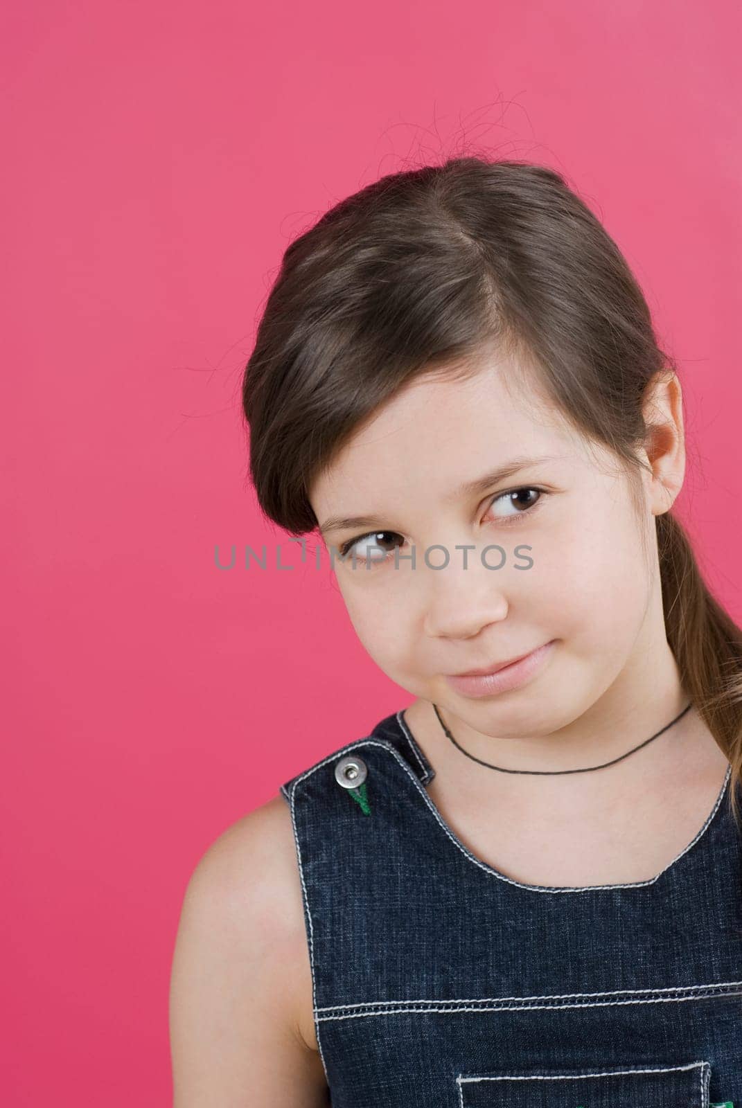 Close_up of a girl thinking and looking sideways