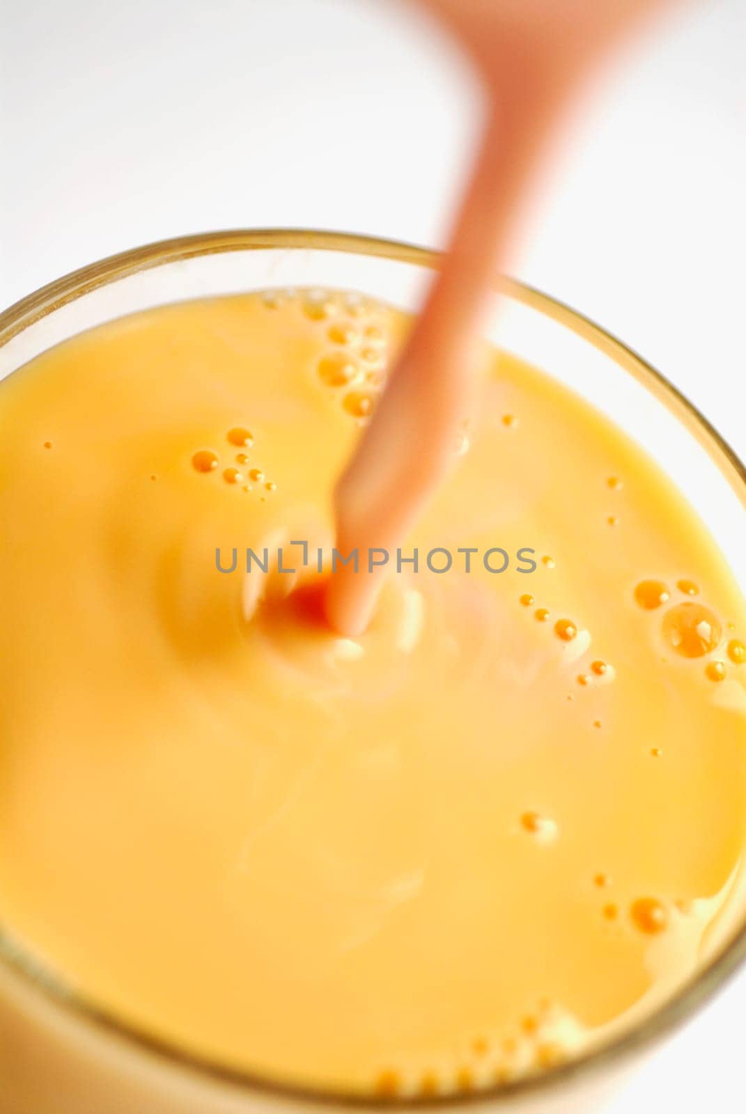 Close-up of juice being poured into a glass