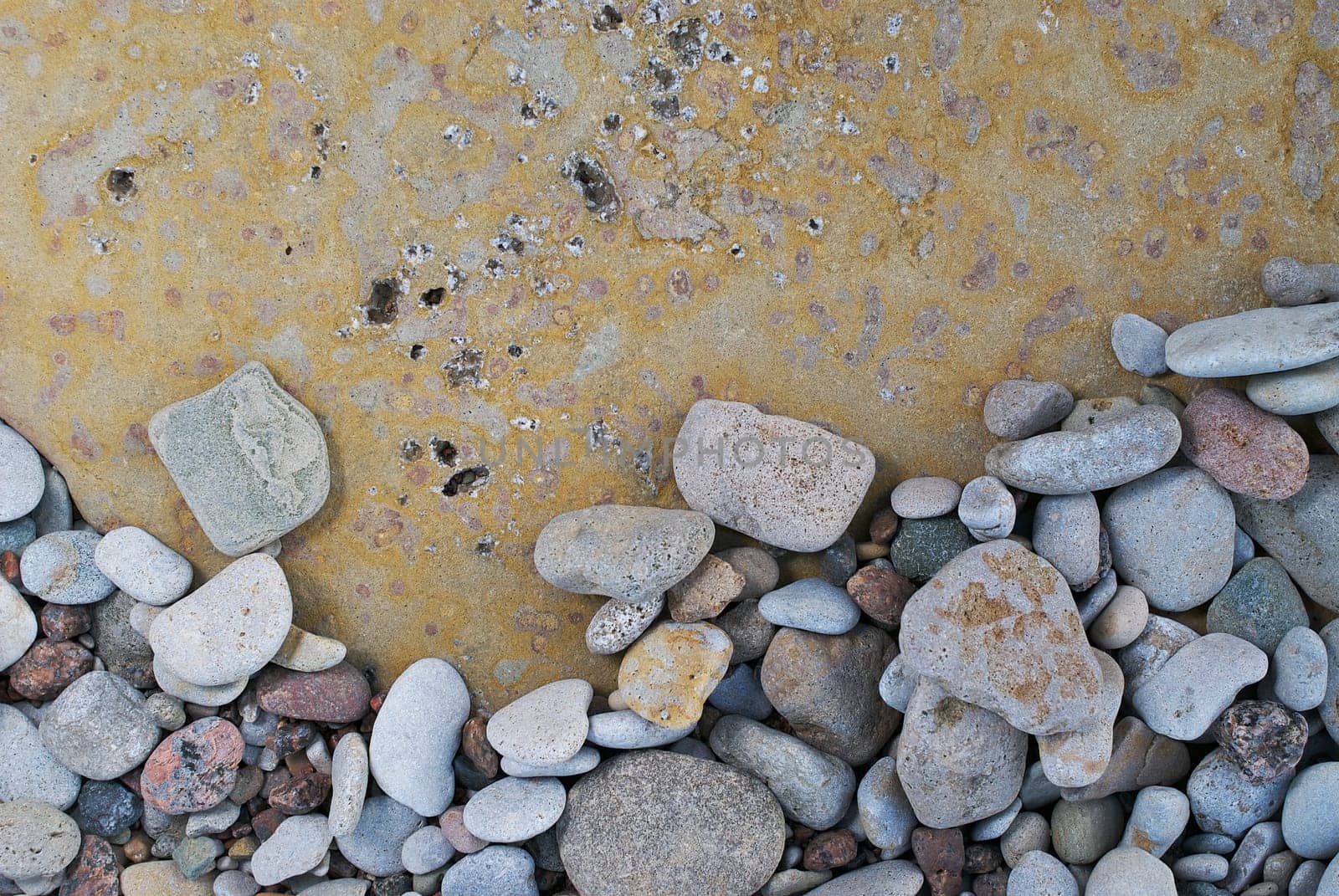 Close_up of pebbles on rock surface