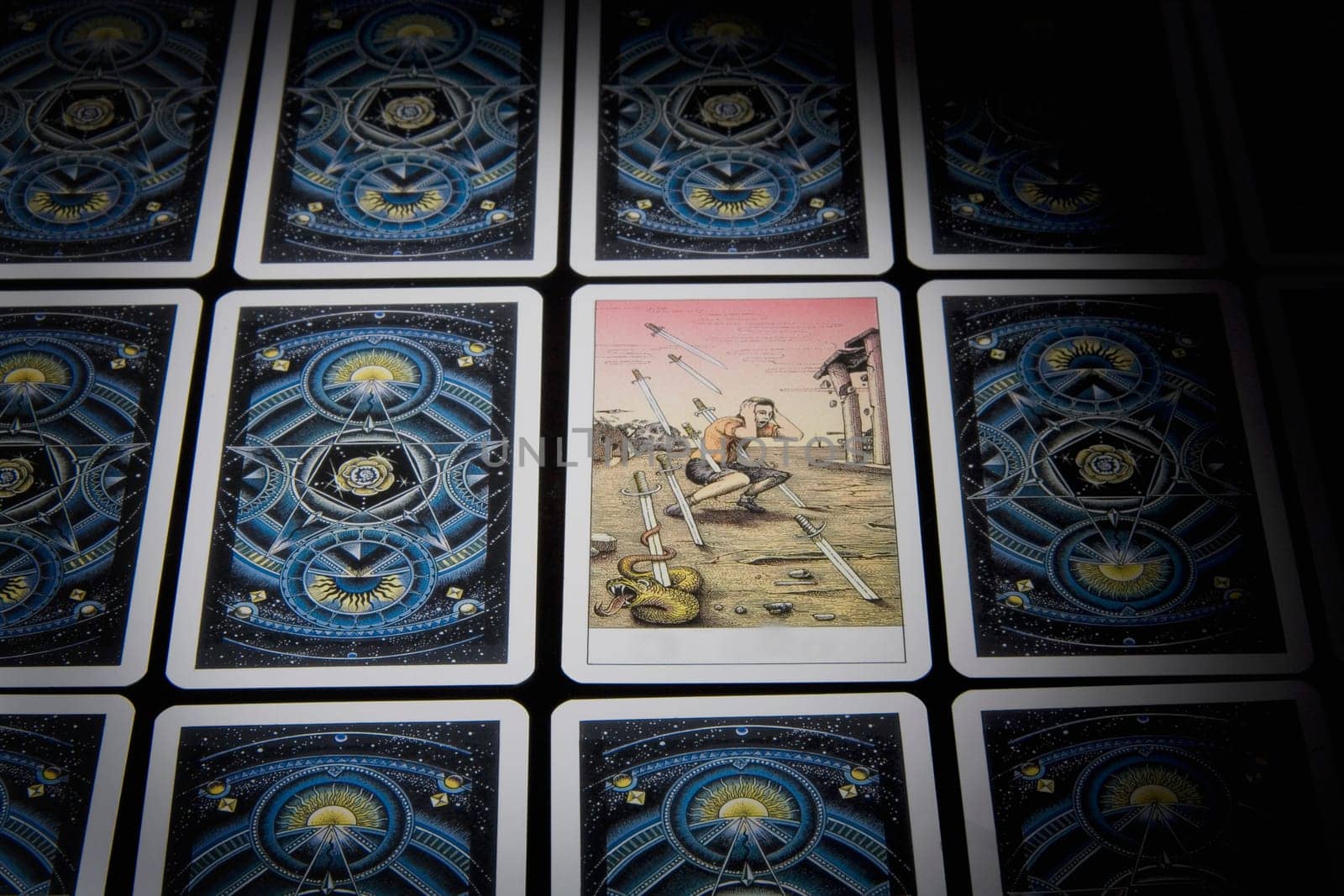 Close-up of tarot cards in a row