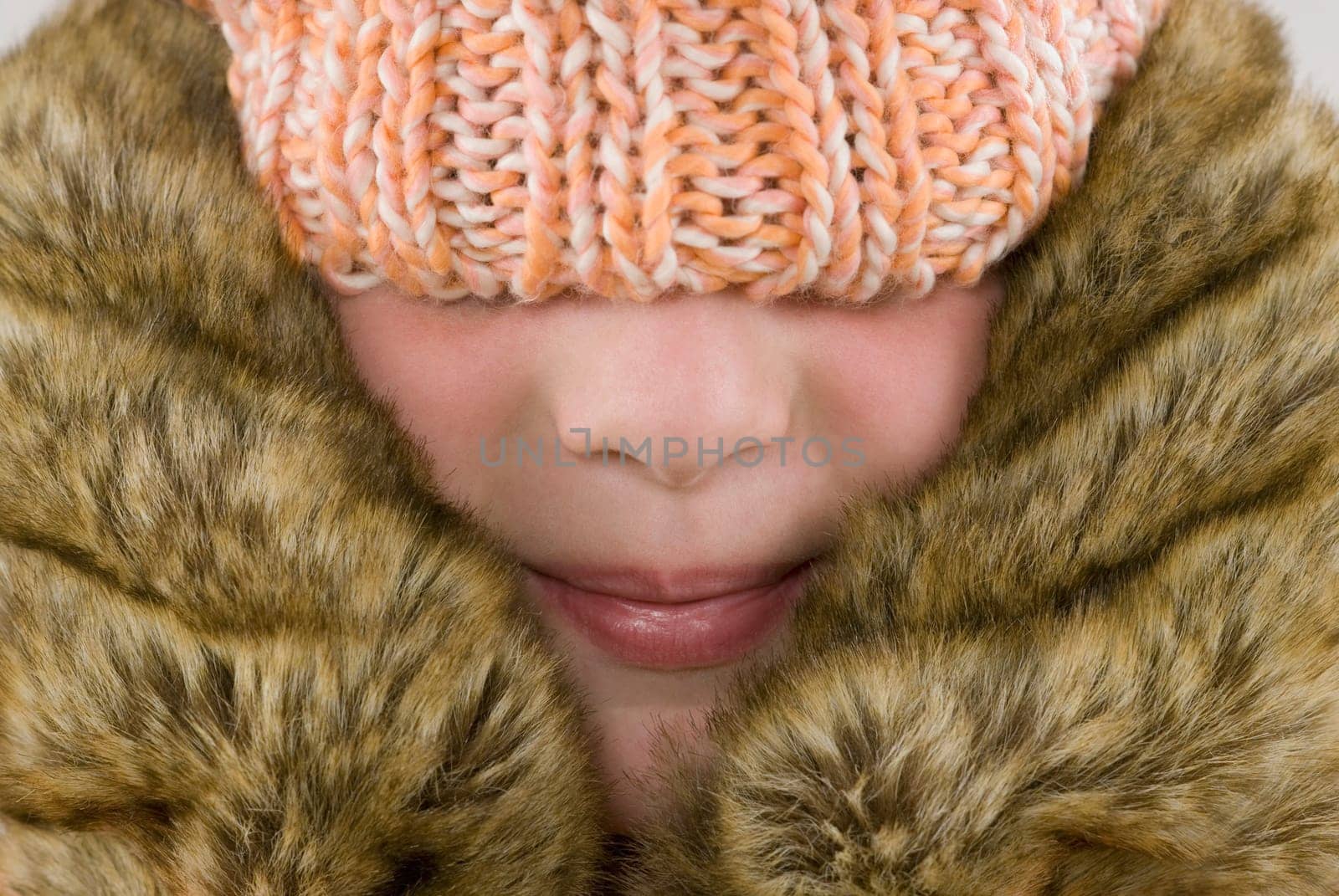 Close_up of a girl wearing a winter coat
