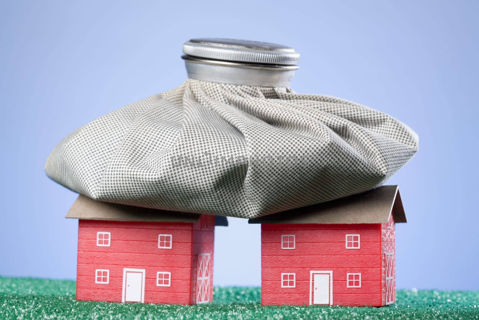 Bag of coins on model homes