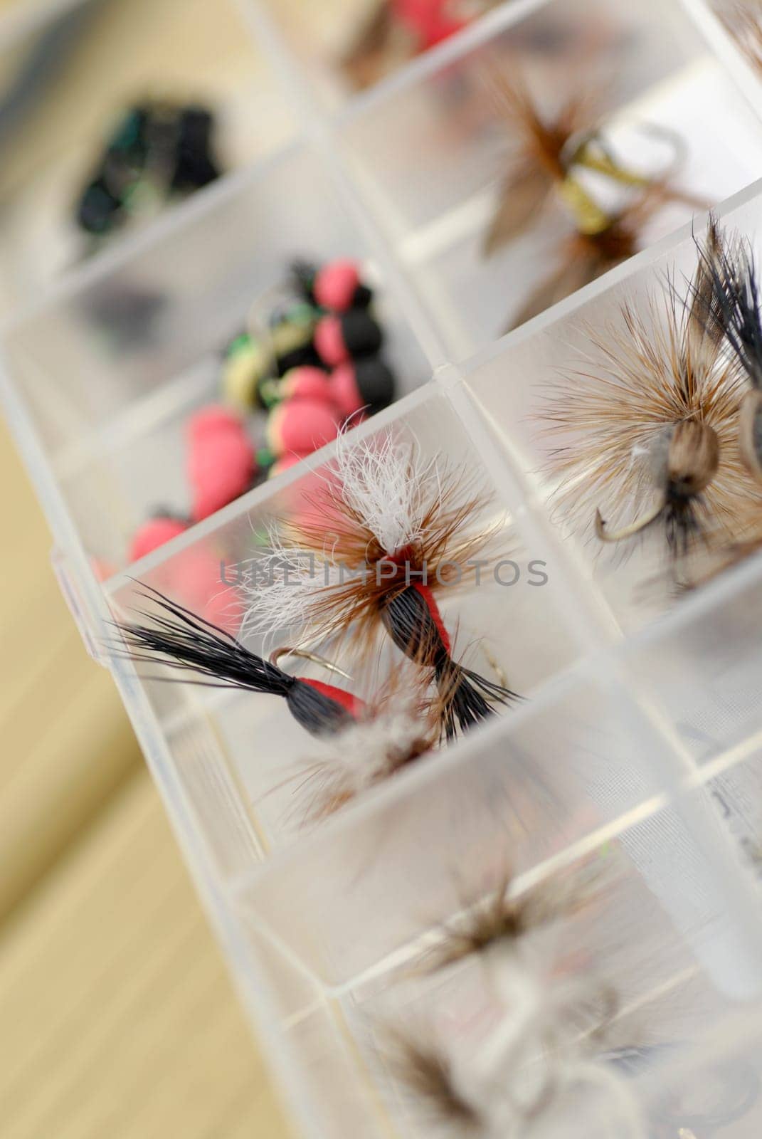 Close-up of fishing lures in a box