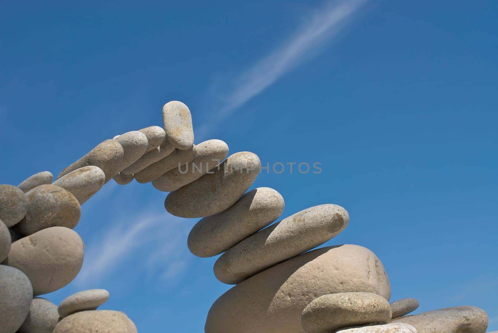 Low angle view of stones arranged in an arch shape