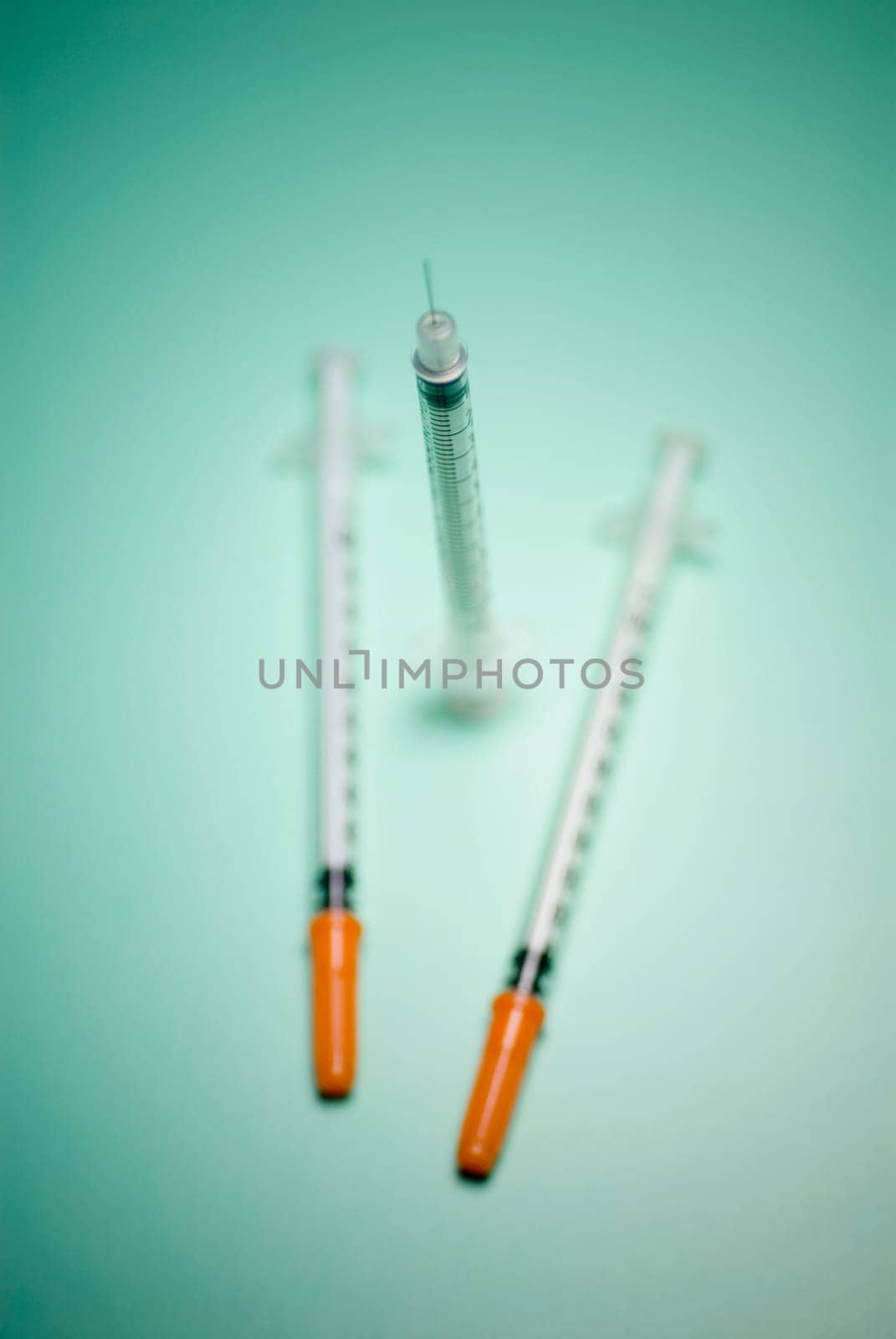 Close_up of three syringes