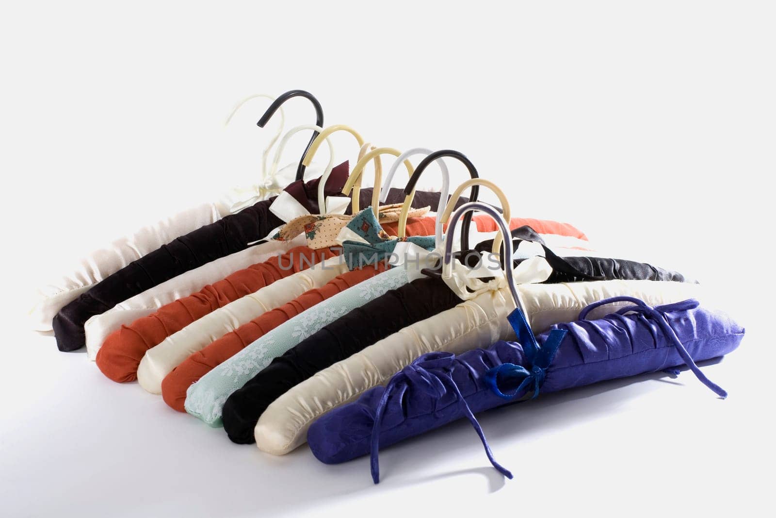 Close-up of hangers in a row
