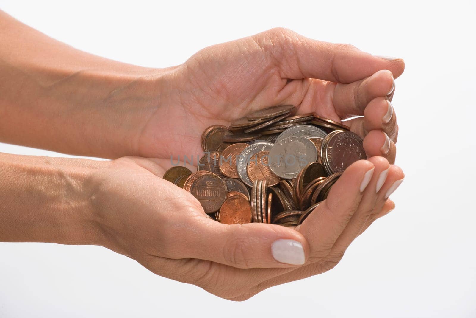 Coins in a personŽs hands cupped