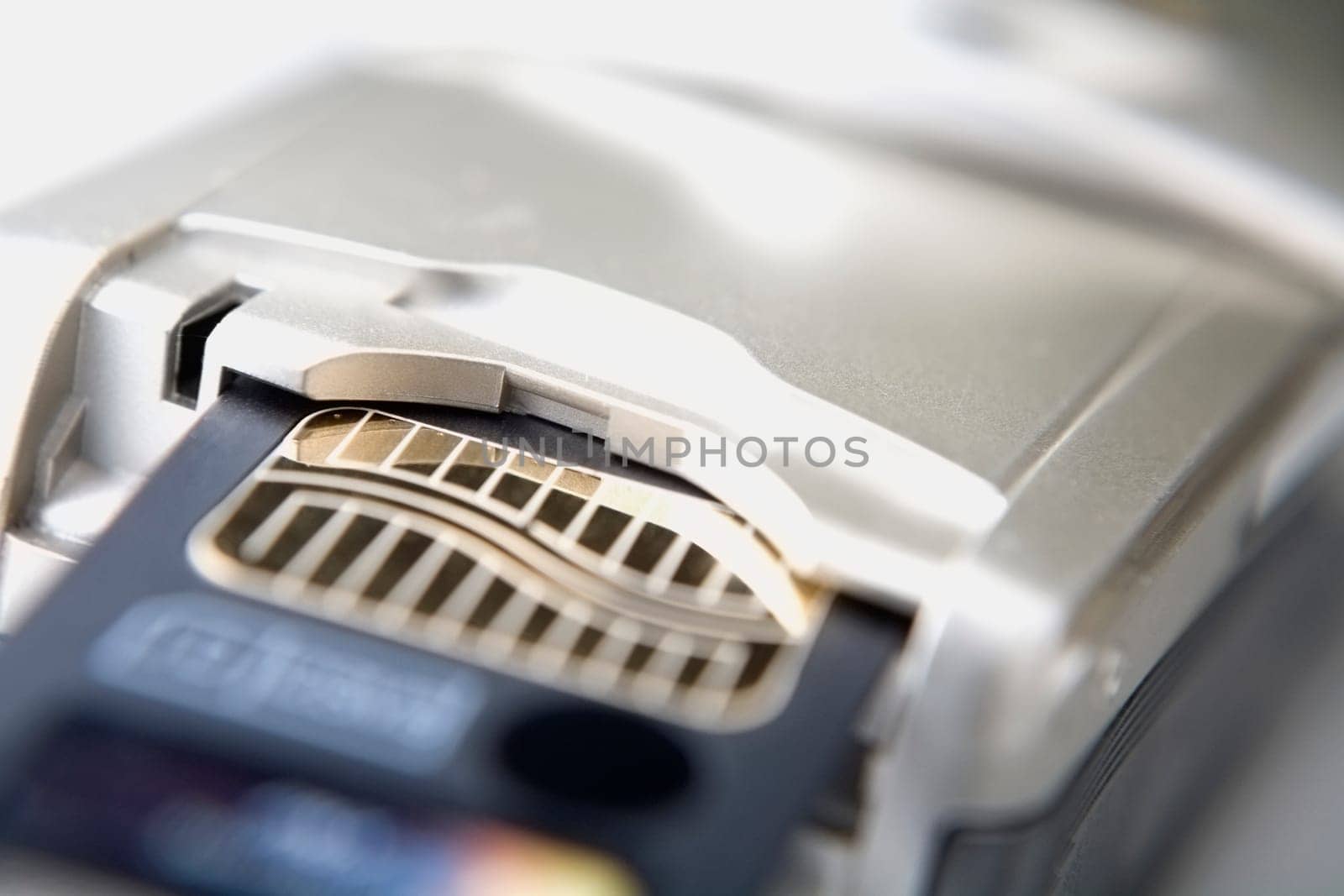 Close-up of a mobile phone and a memory card
