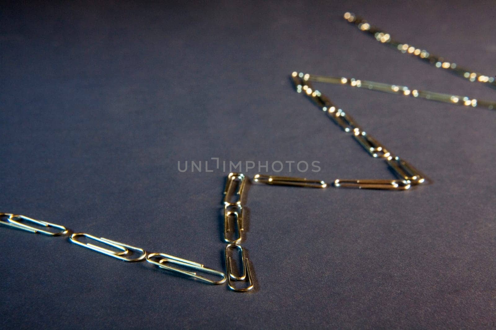 Close-up of a chain of paper clips
