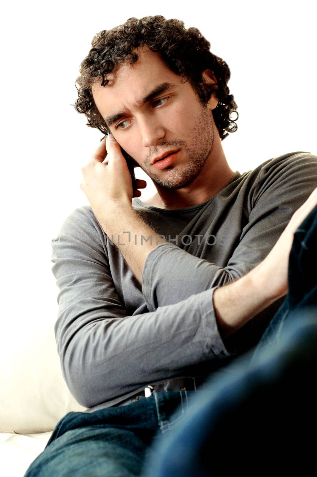Young man talking on a mobile phone