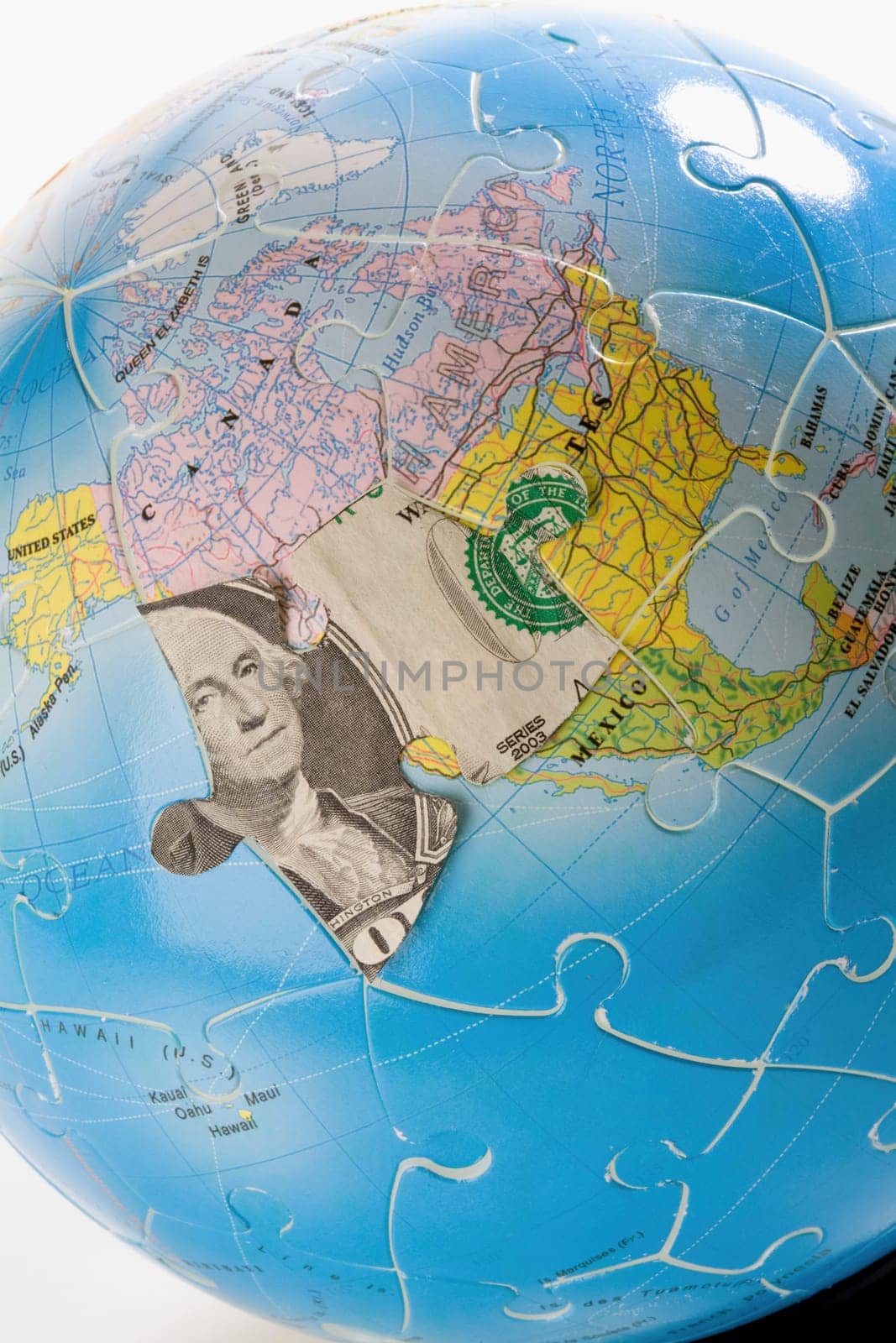 Close_up of a globe made of jigsaw puzzles