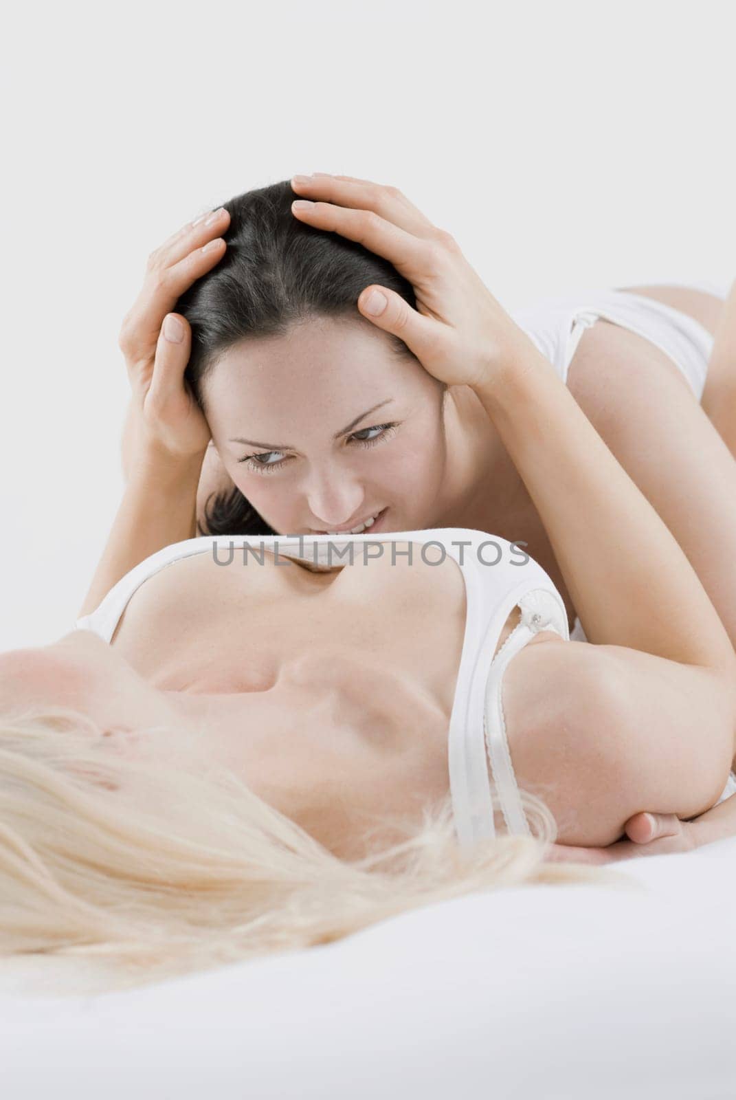 Female homosexual couple doing sexual activity