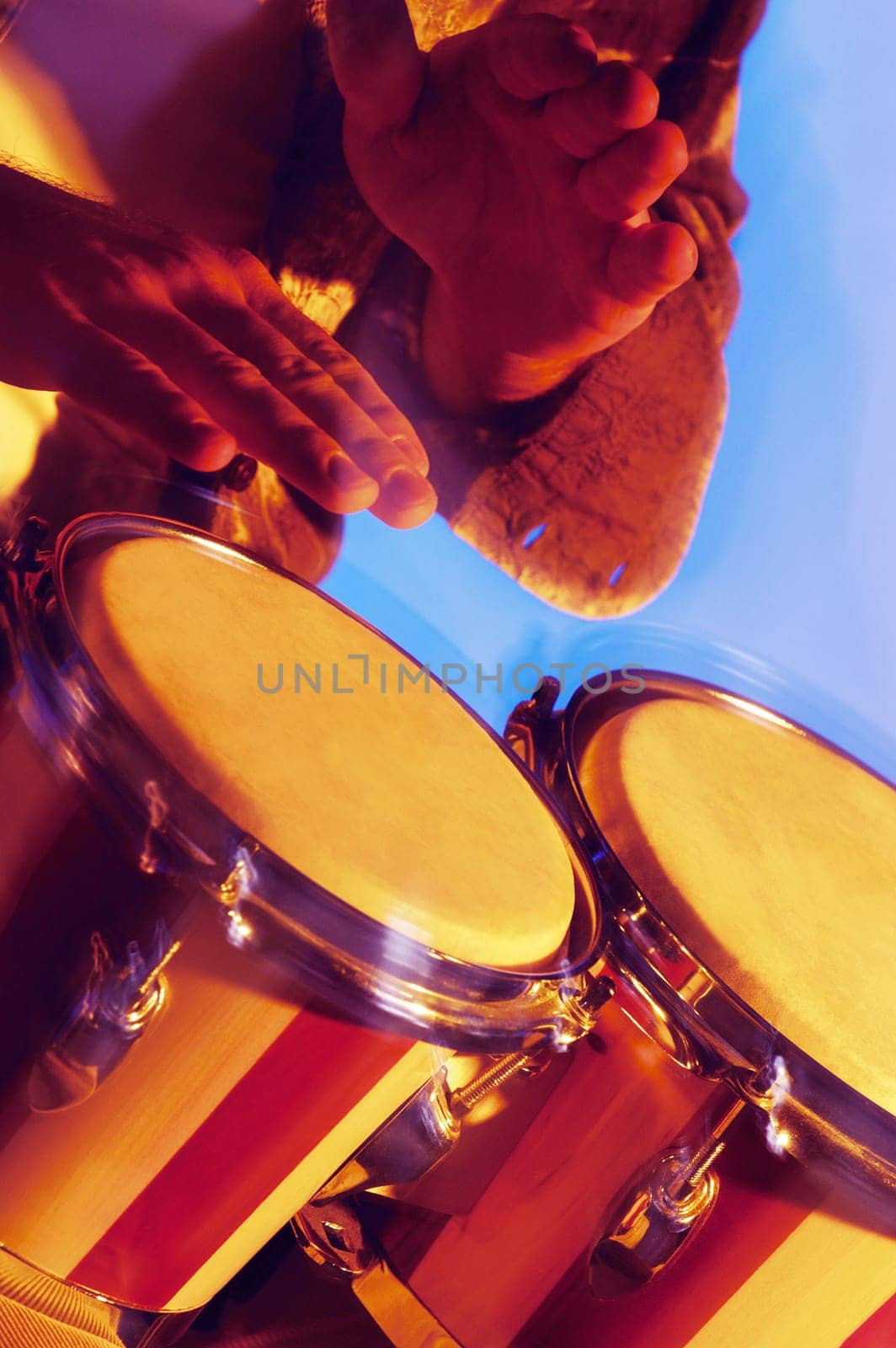 Close-up of a musician playing the bongo