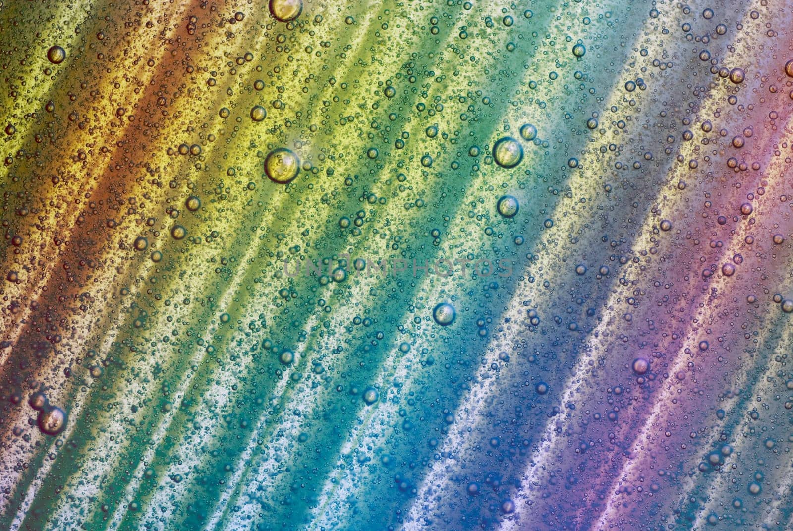 Water drops on a colored surface