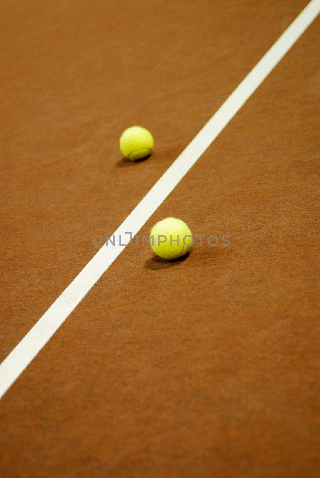 Close-up of a yard line between two tennis balls