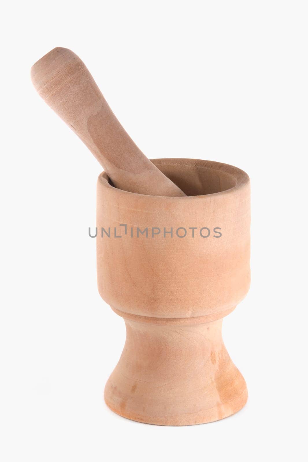 Close-up of a wooden mortar and pestle