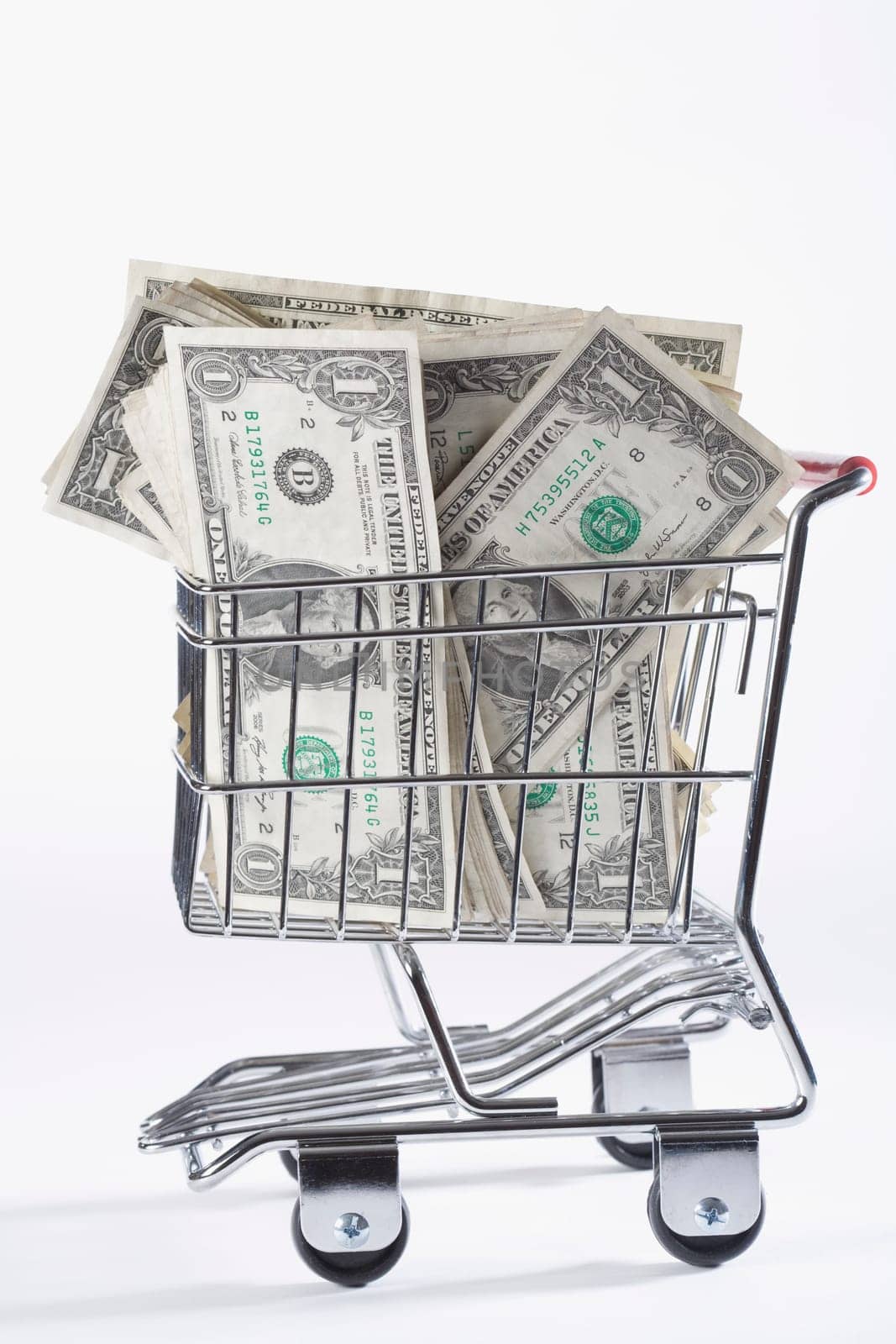 Close_up of paper currency in a shopping cart