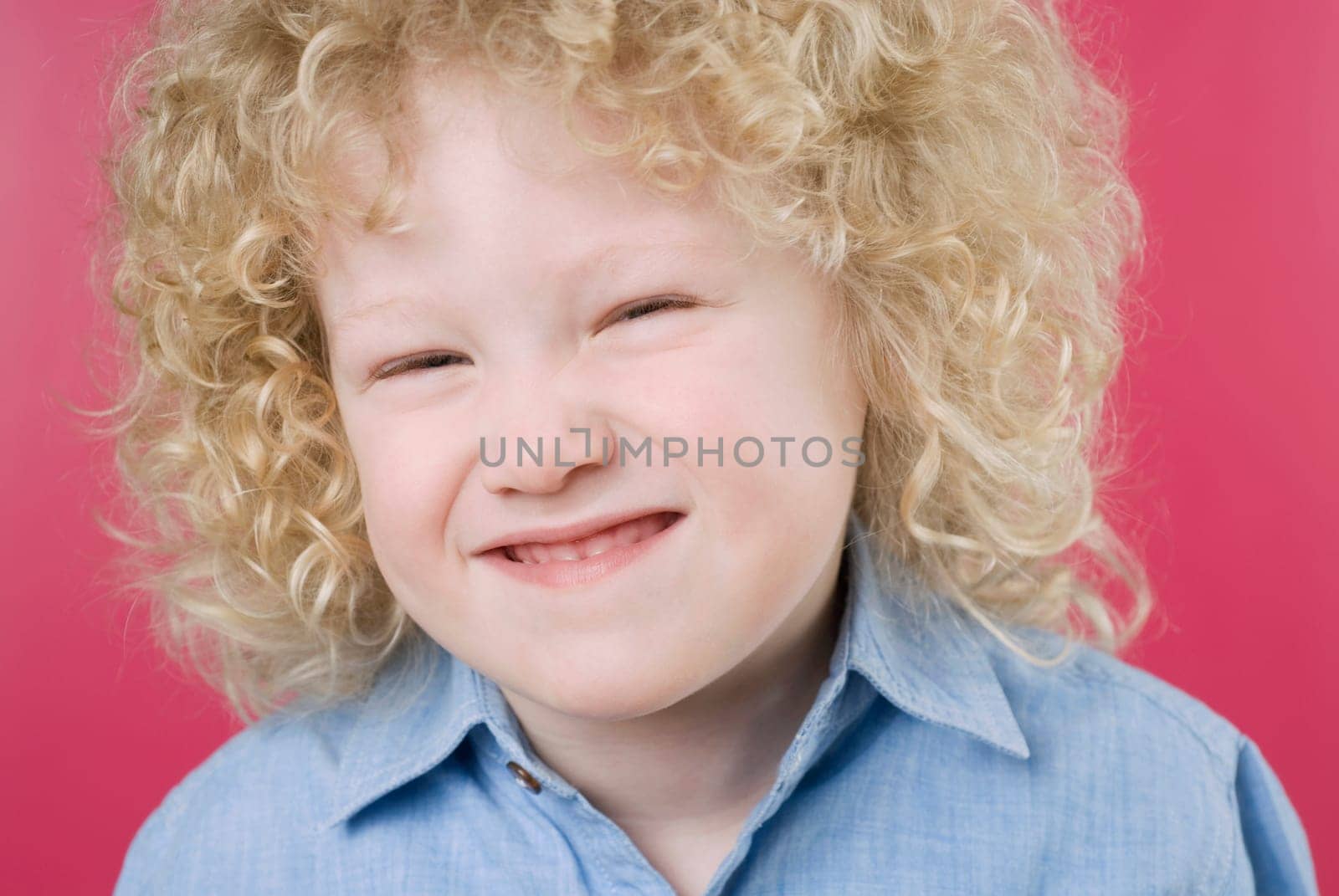 Close_up of a boy making a face