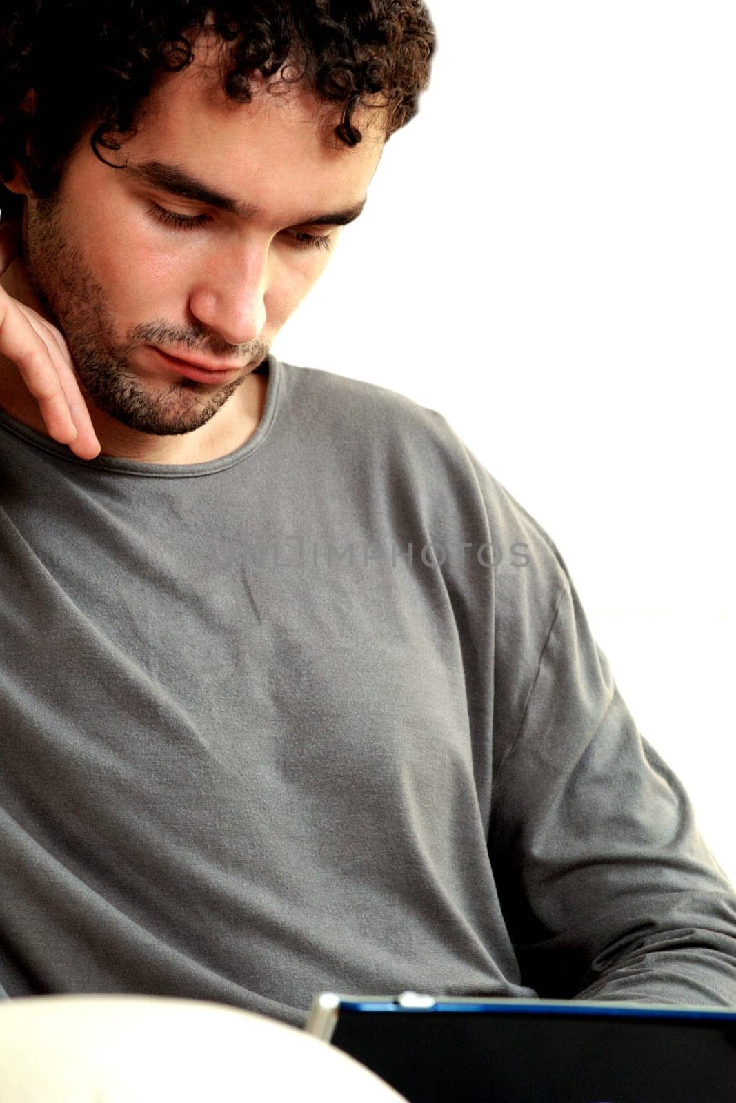 Close-up of a young man looking down