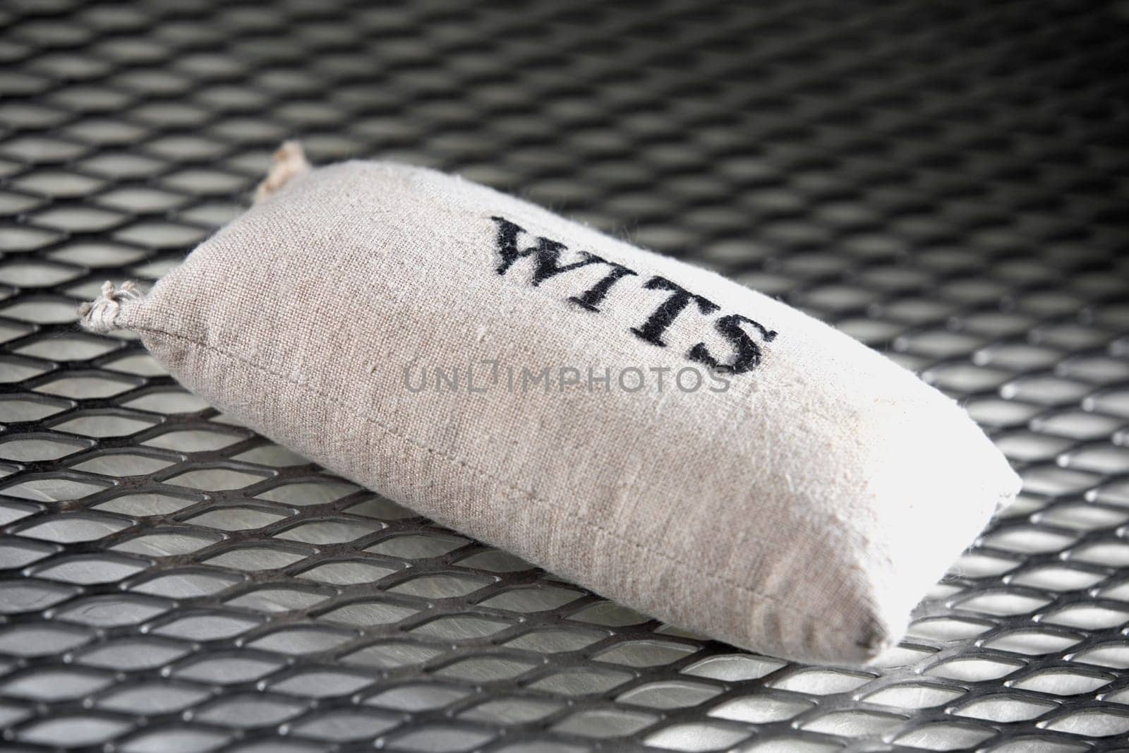 Close-up of a sack with the word wits written on it