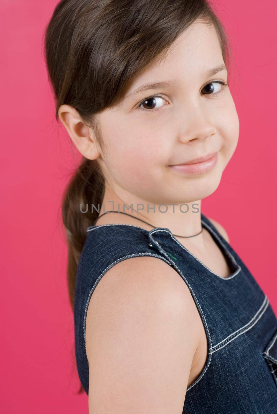 Side profile of a girl smiling