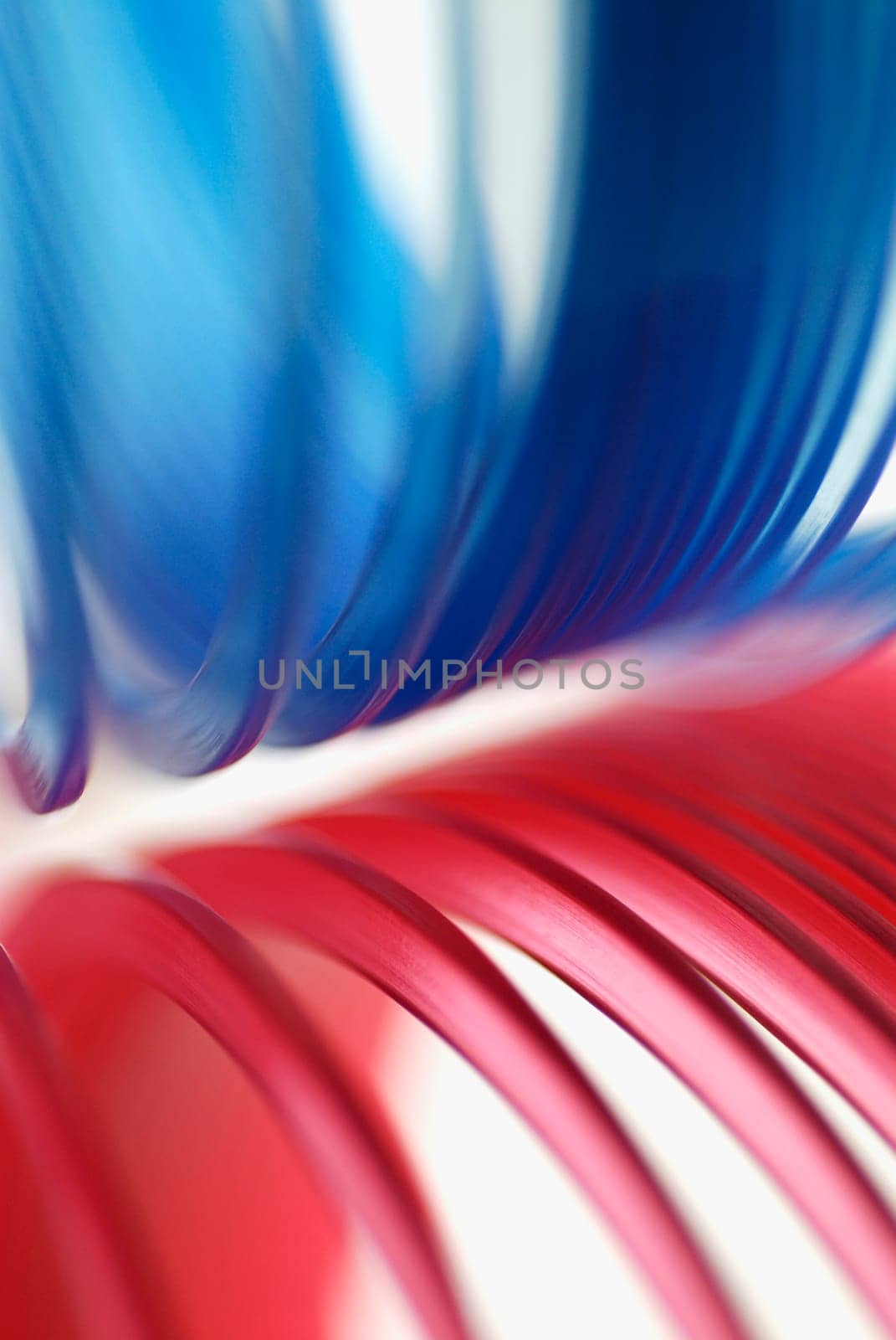 Close-up of red and blue fiber optic cables