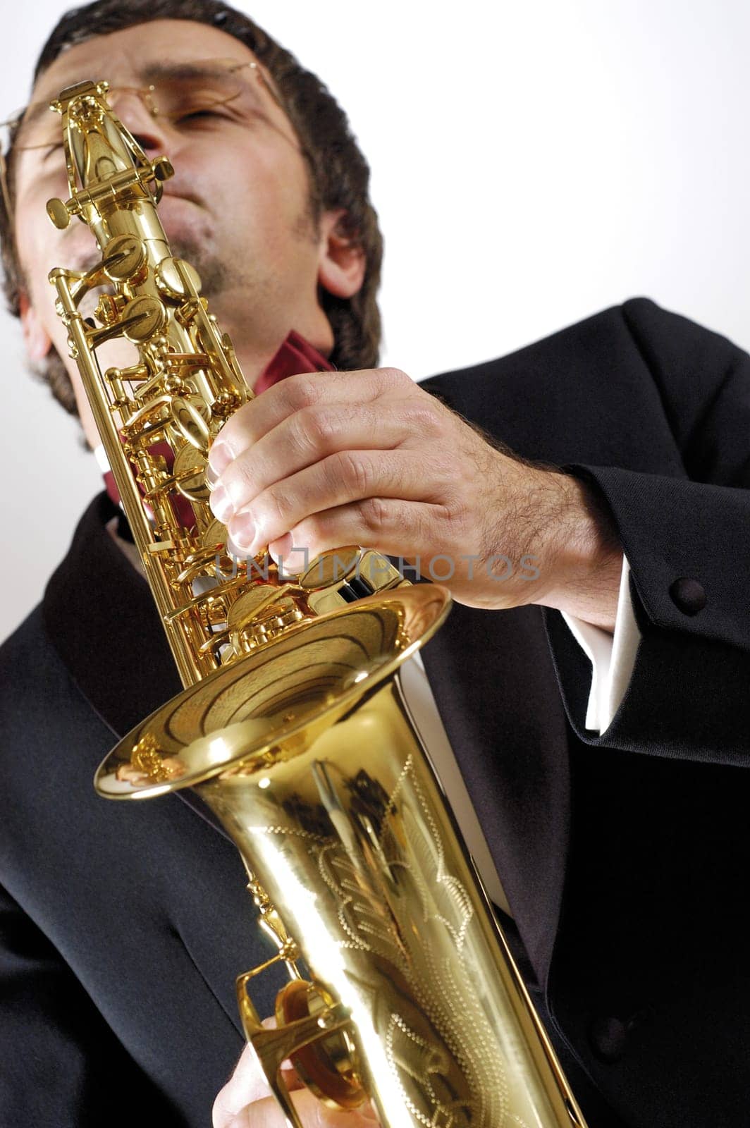 Low angle view of a musician playing the saxophone