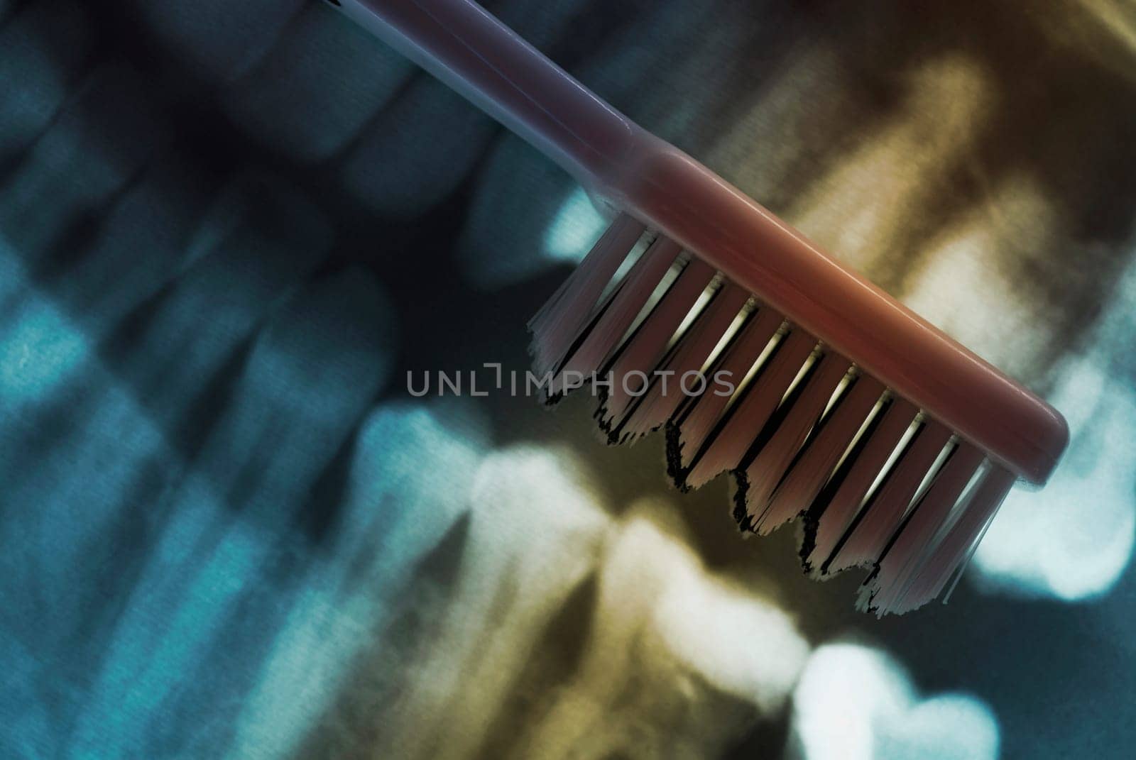 Close_up of a toothbrush on a dental X_Ray