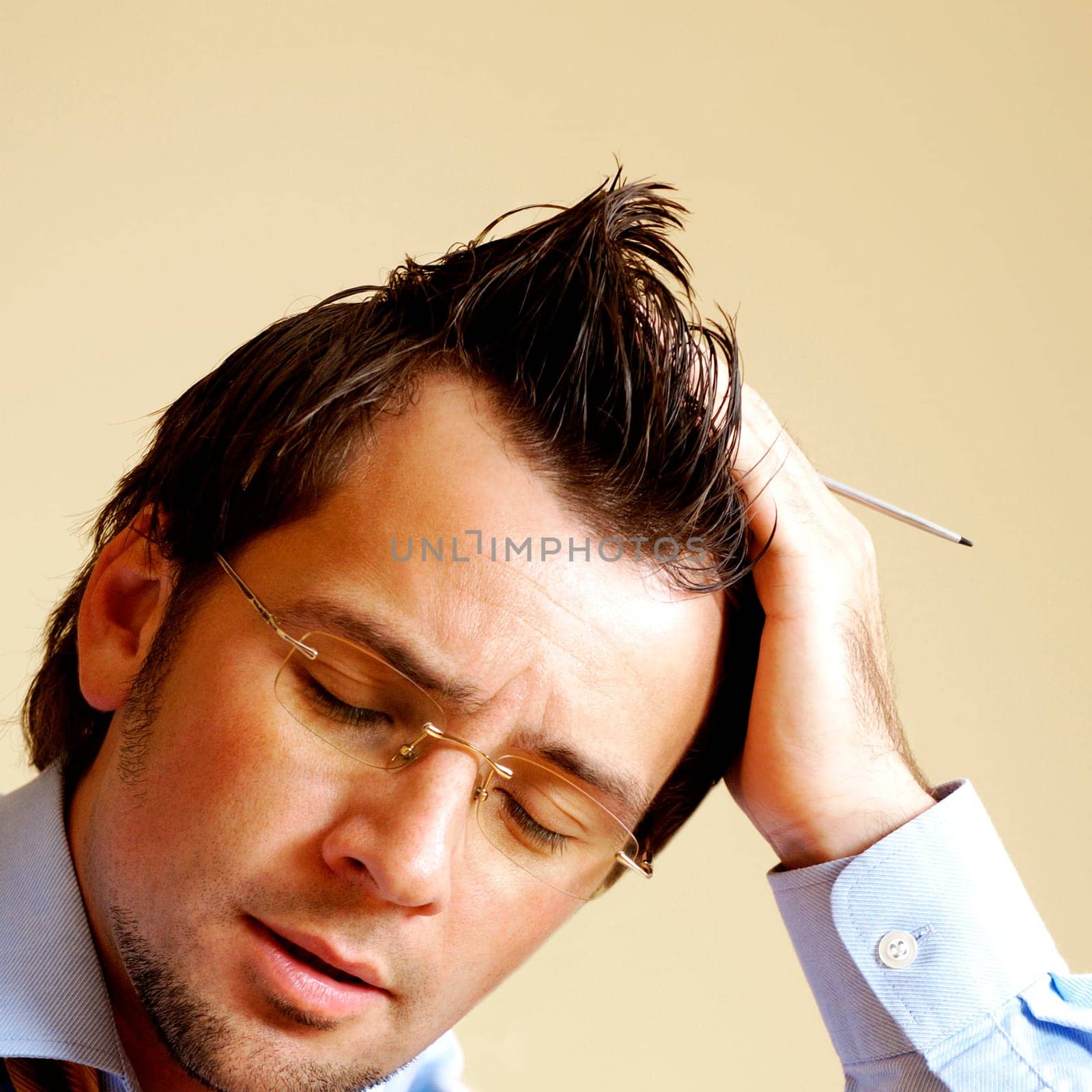 Close-up of a businessman holding a digitized pen