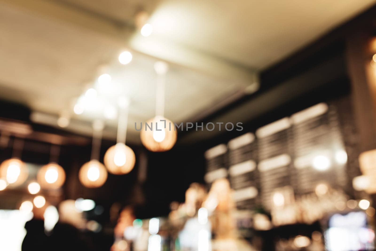 Blurred loft coffee shop with barista and customer. High quality photo
