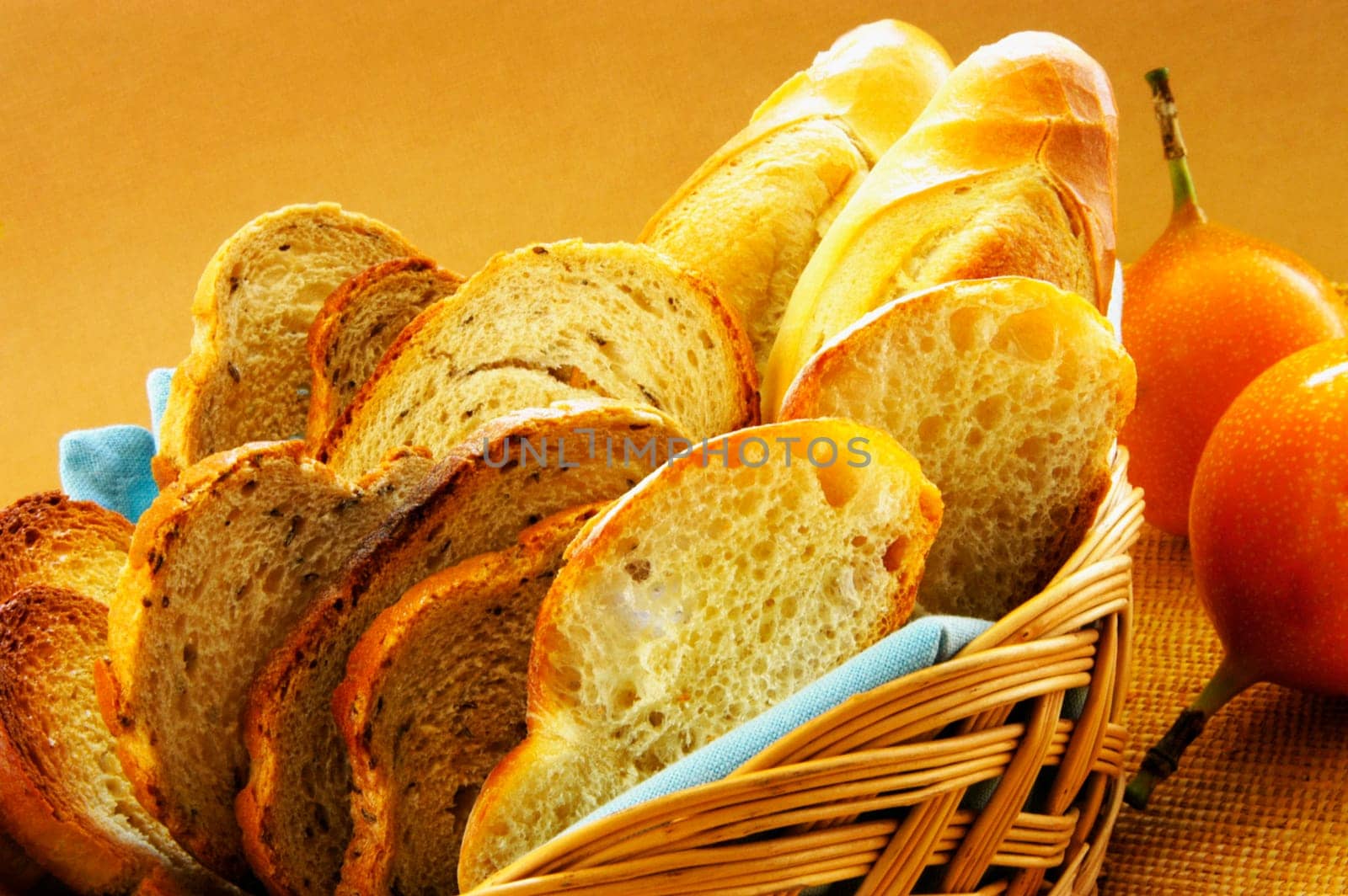 Close-up of bread in a basket with fruits