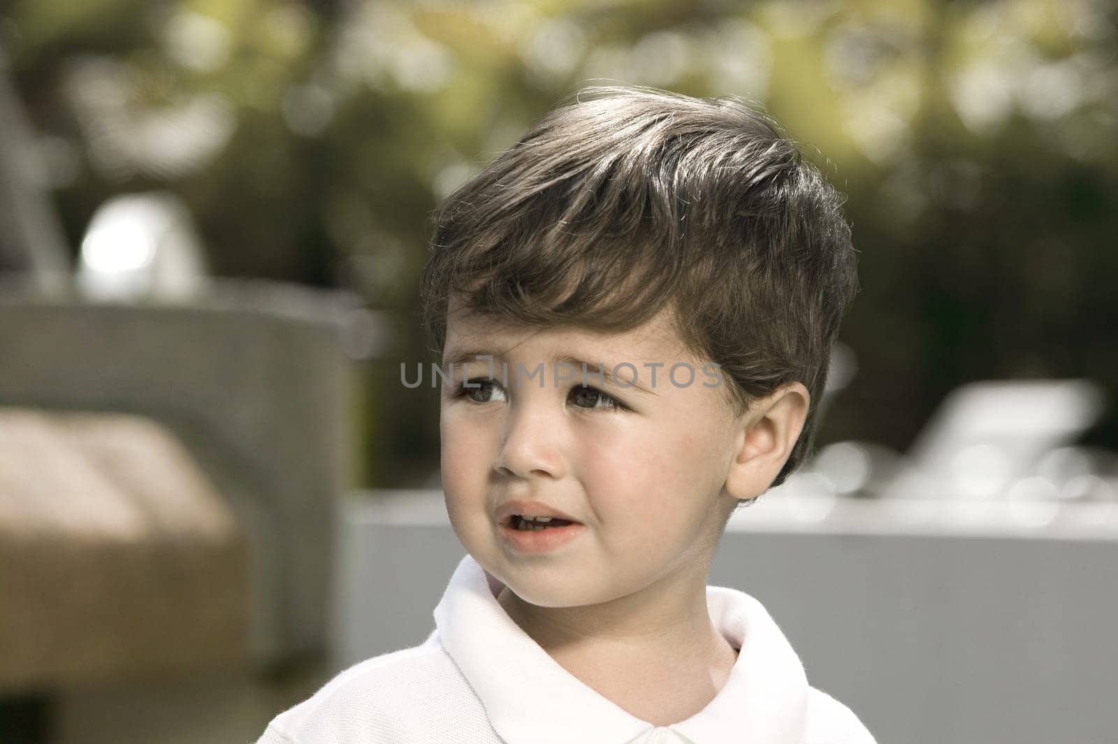 Close-up of a boy looking sad
