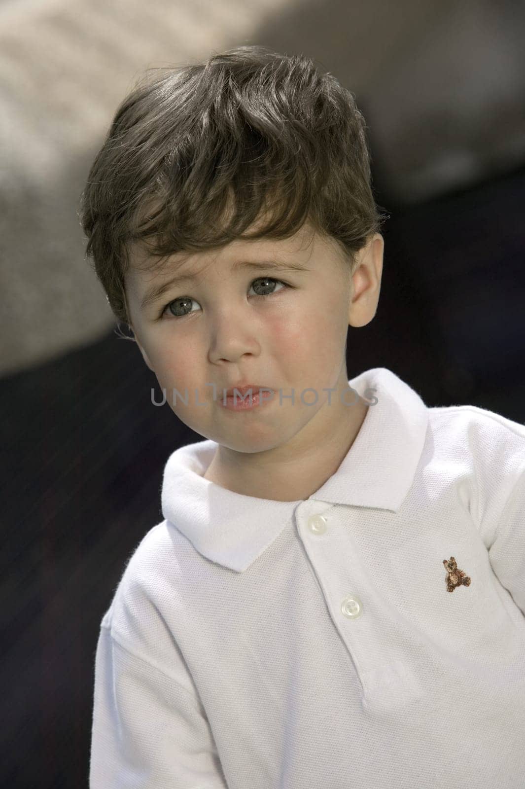 Close-up of a boy looking sad