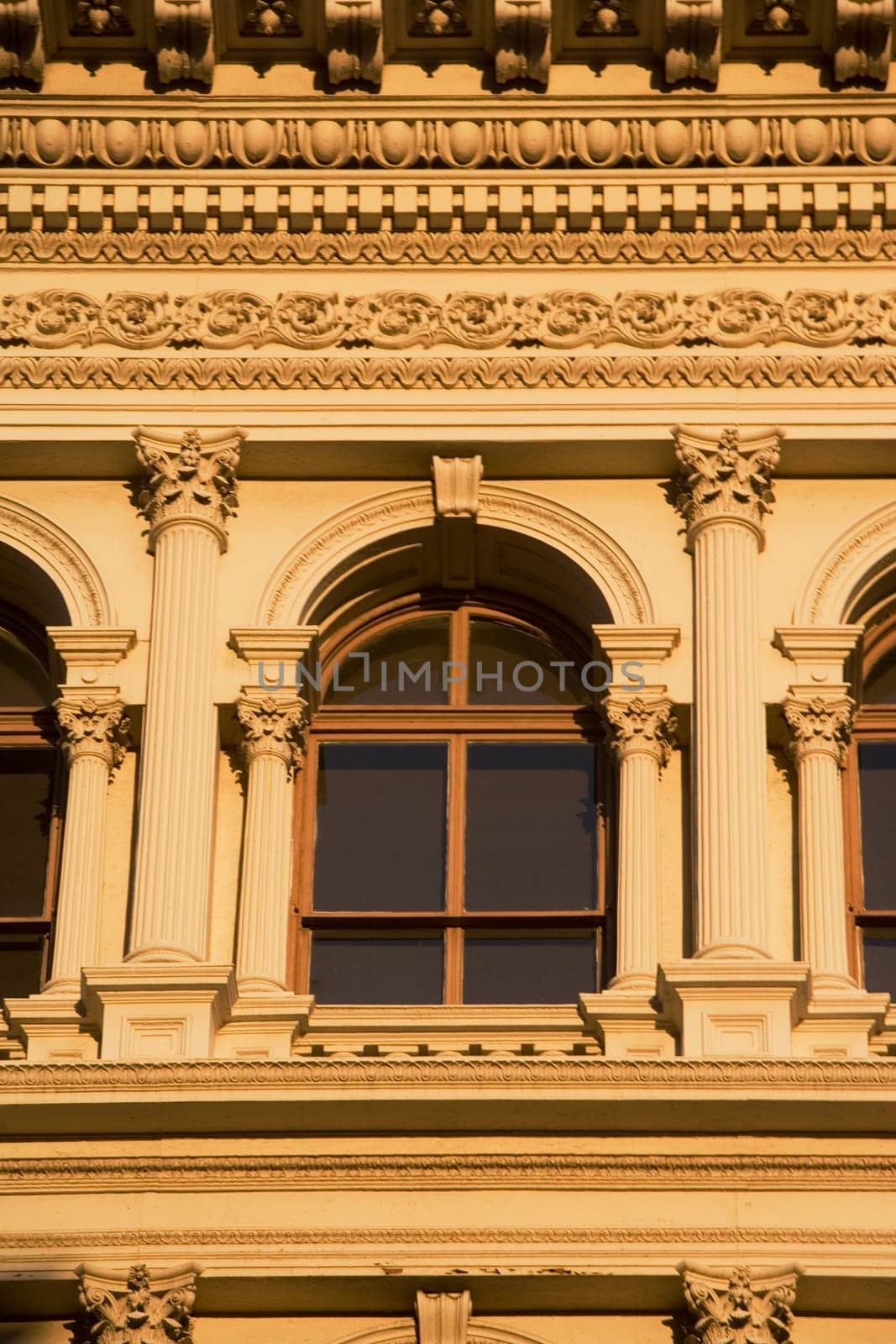 Building with windows and carved panels