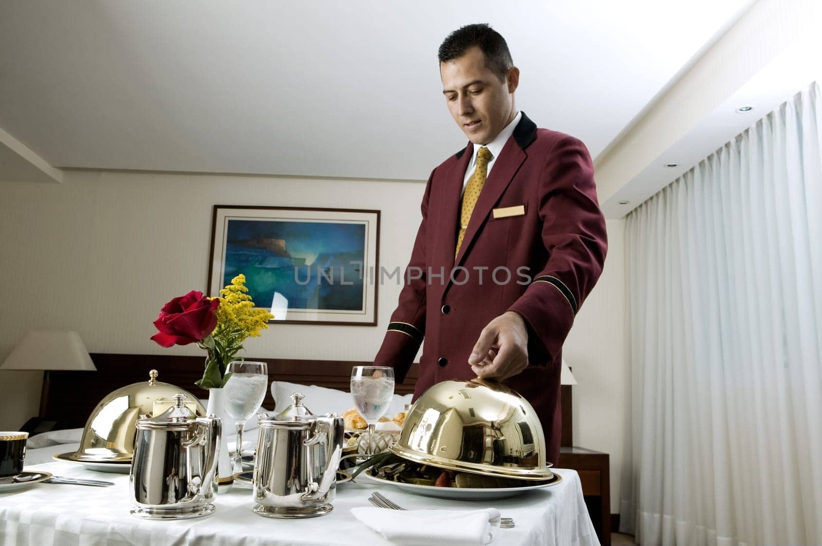 Waiter serving food