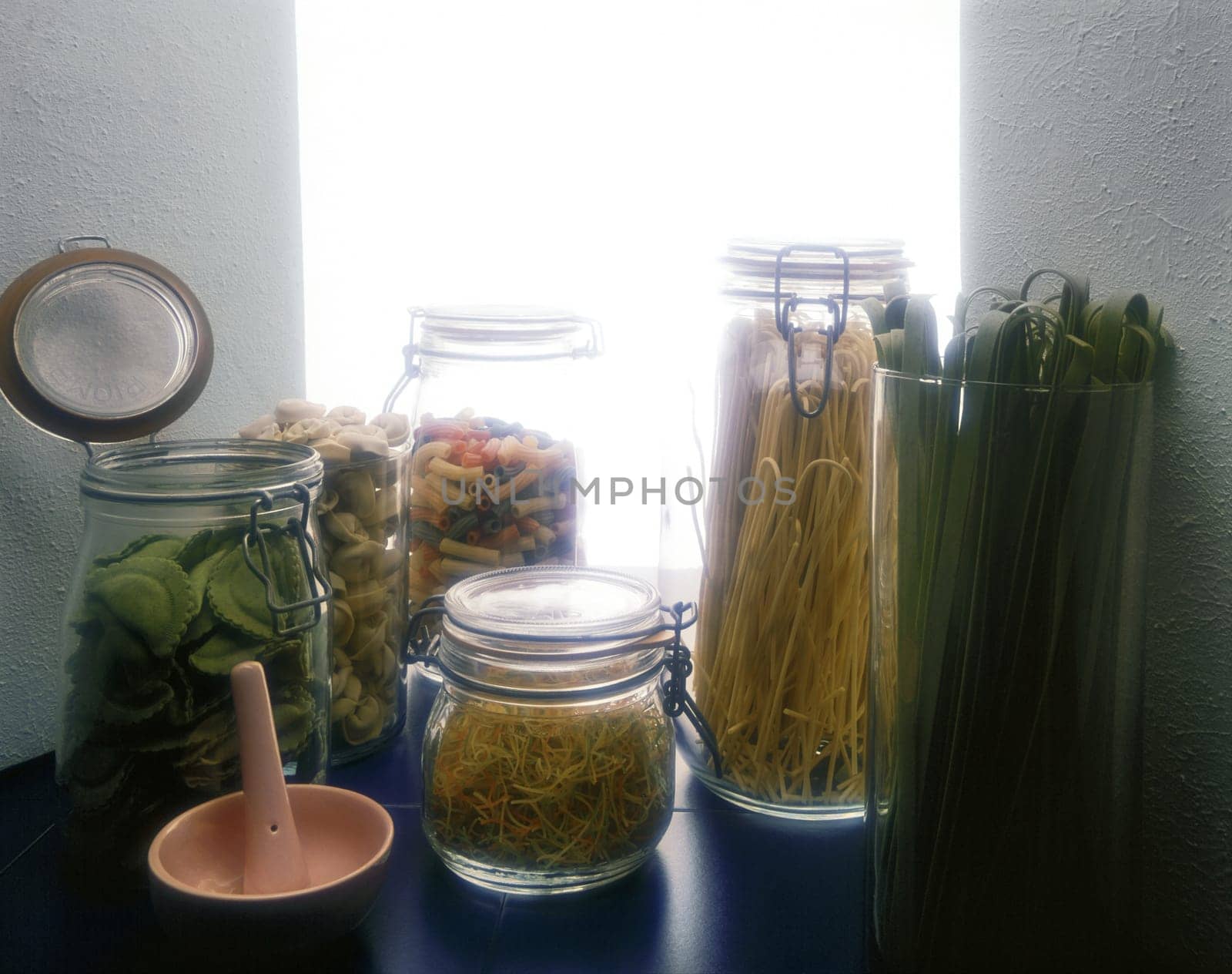 Assorted pasta in glass jars
