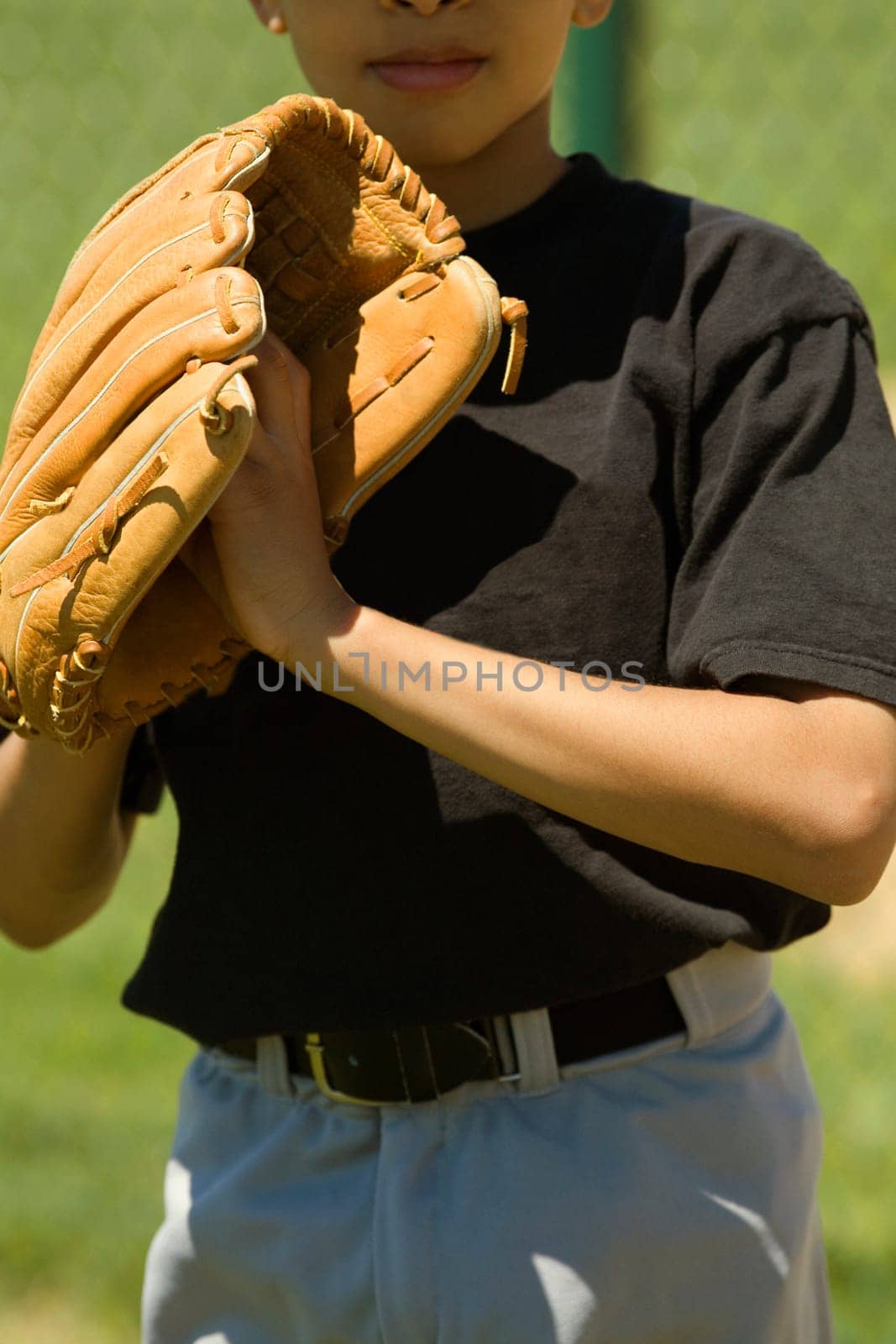 Close-up of a baseball player standing in a baseball field