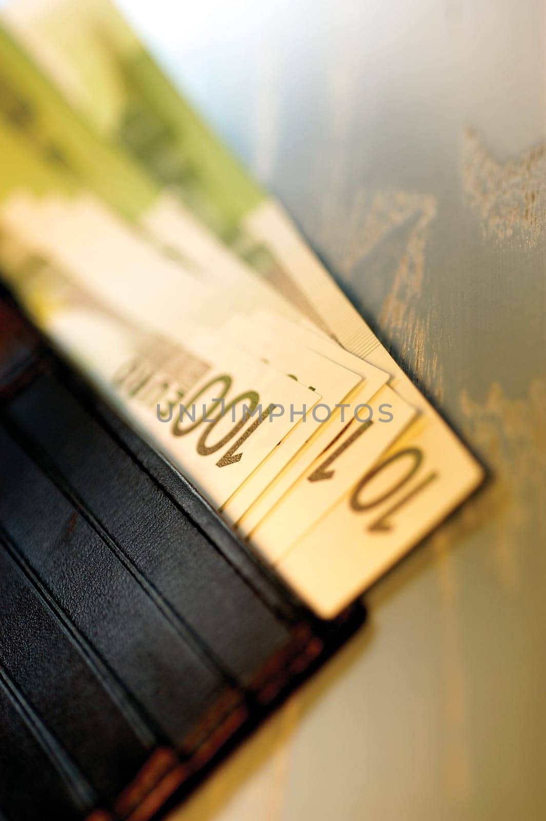 Close-up of one hundred Euro banknotes in a wallet