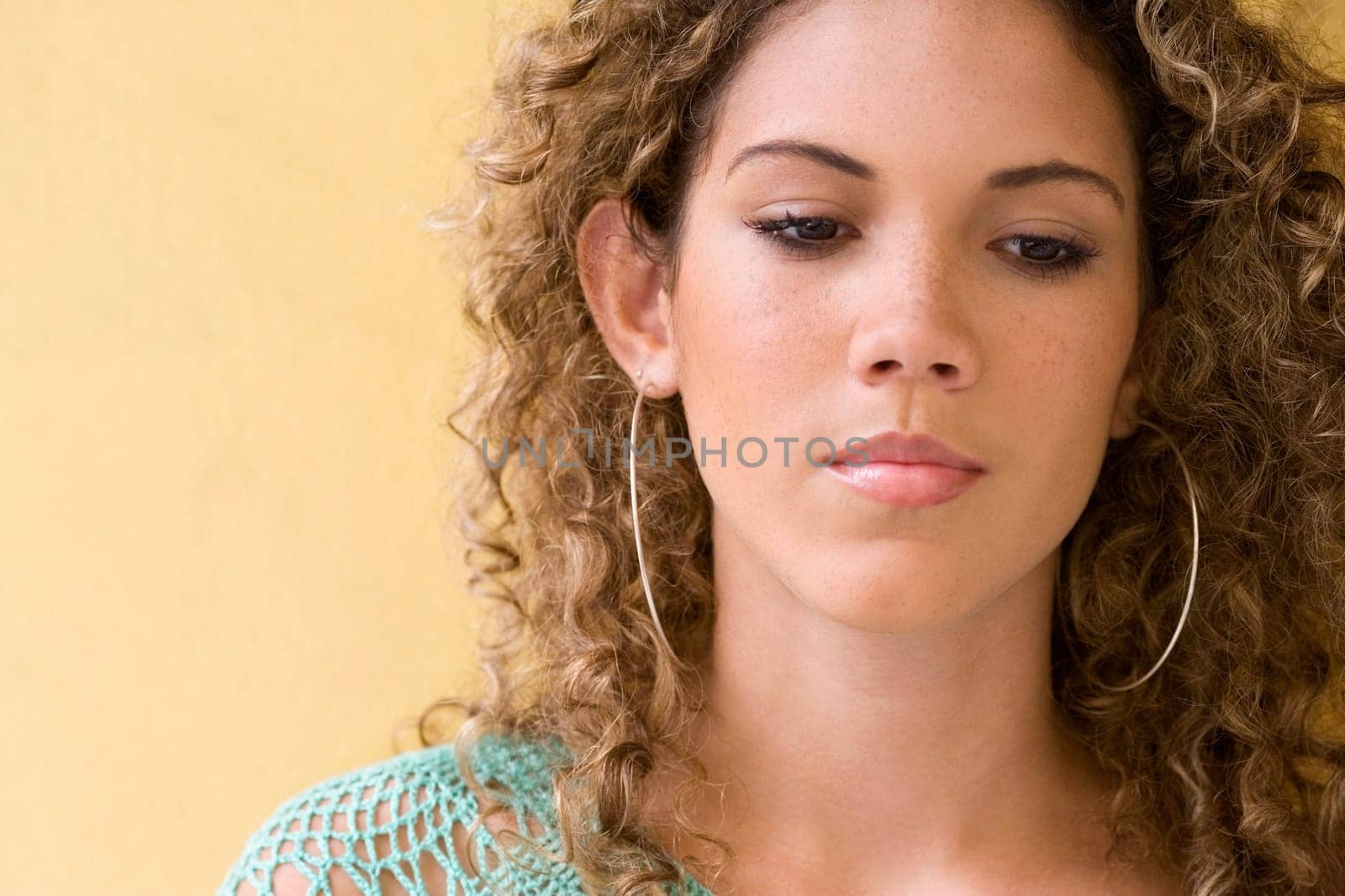 Close-up of a teenage girl thinking