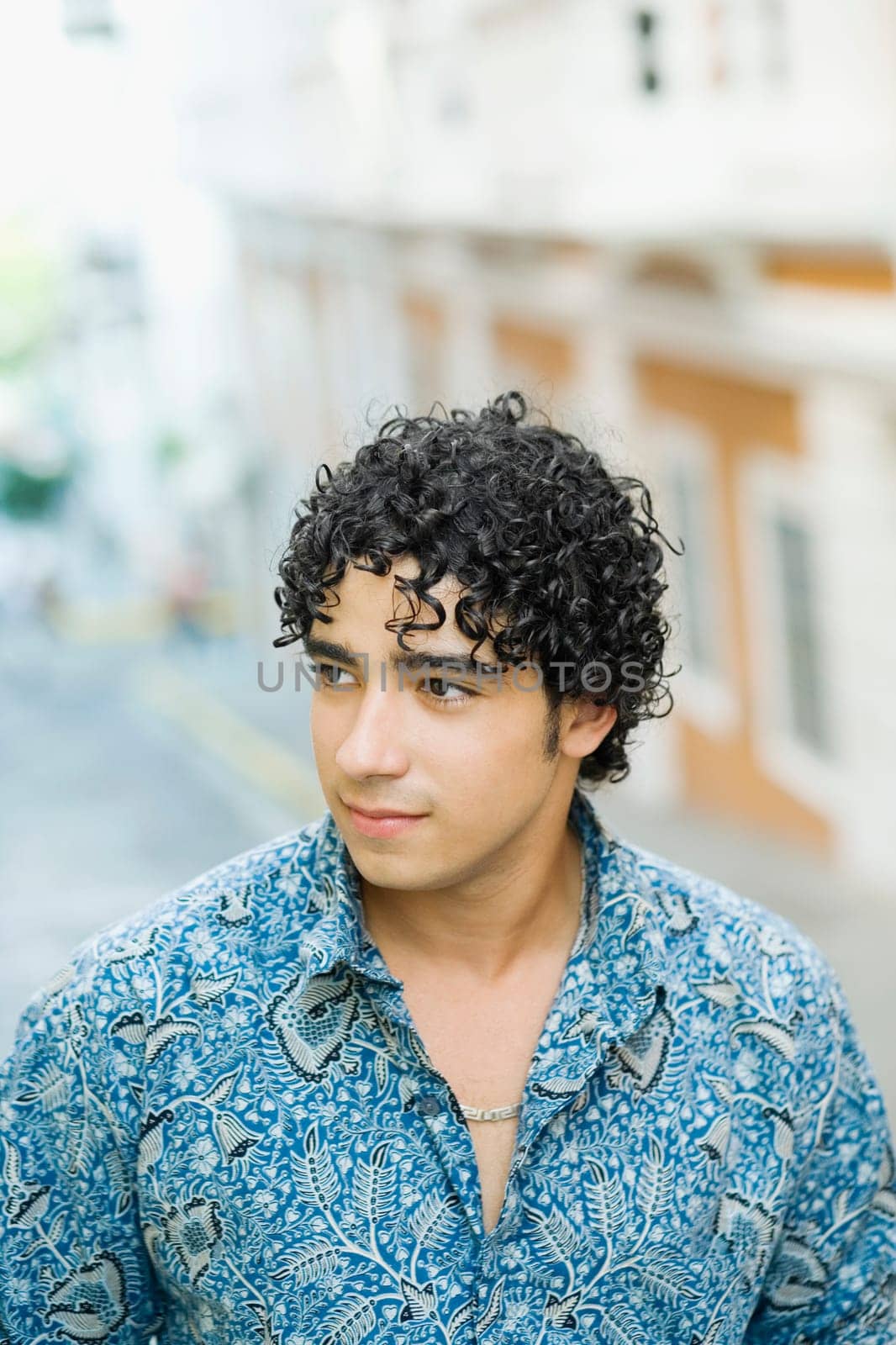 Close-up of a young man looking sideways