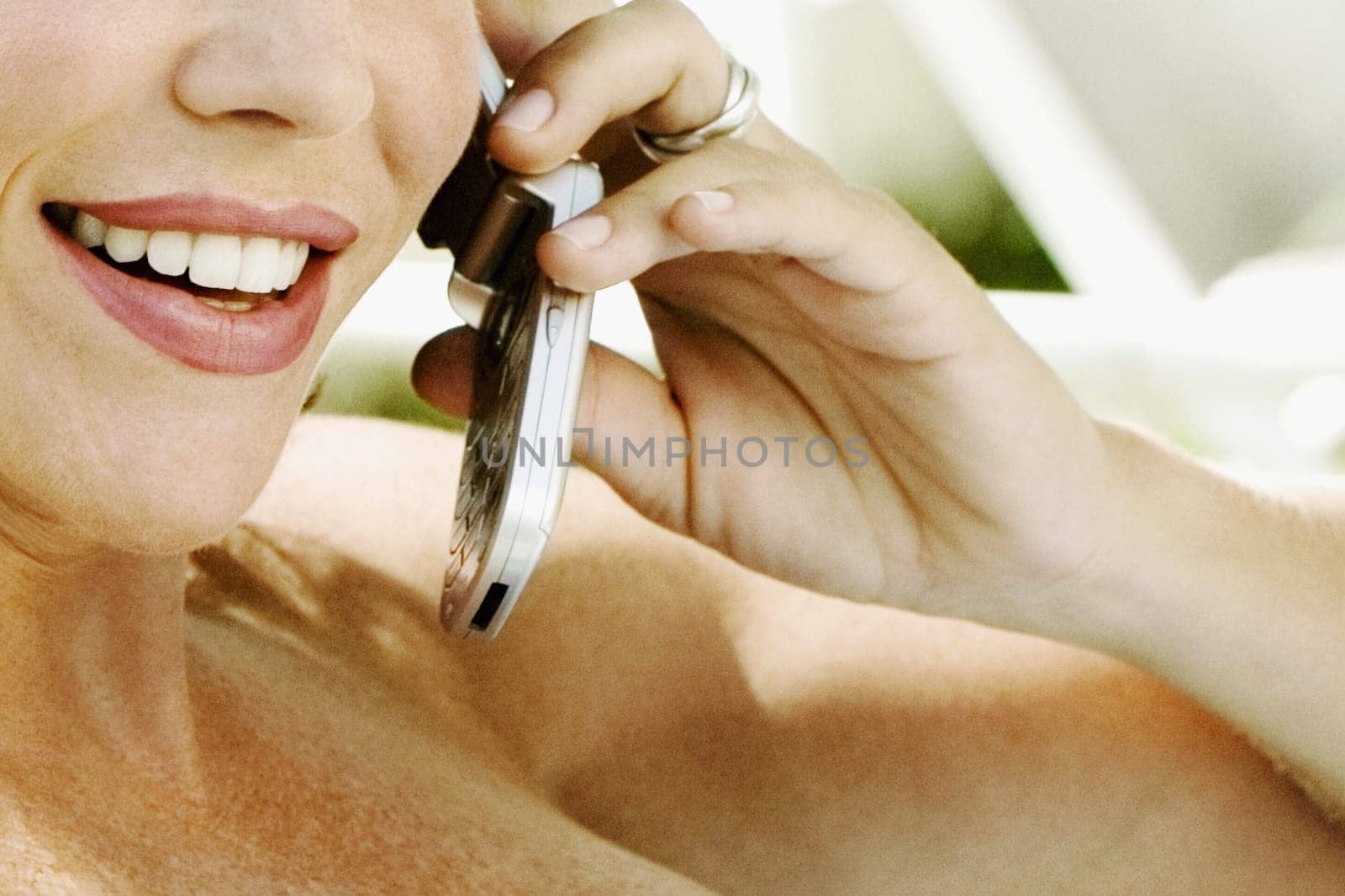 Close-up of a mid adult woman talking on a mobile phone
