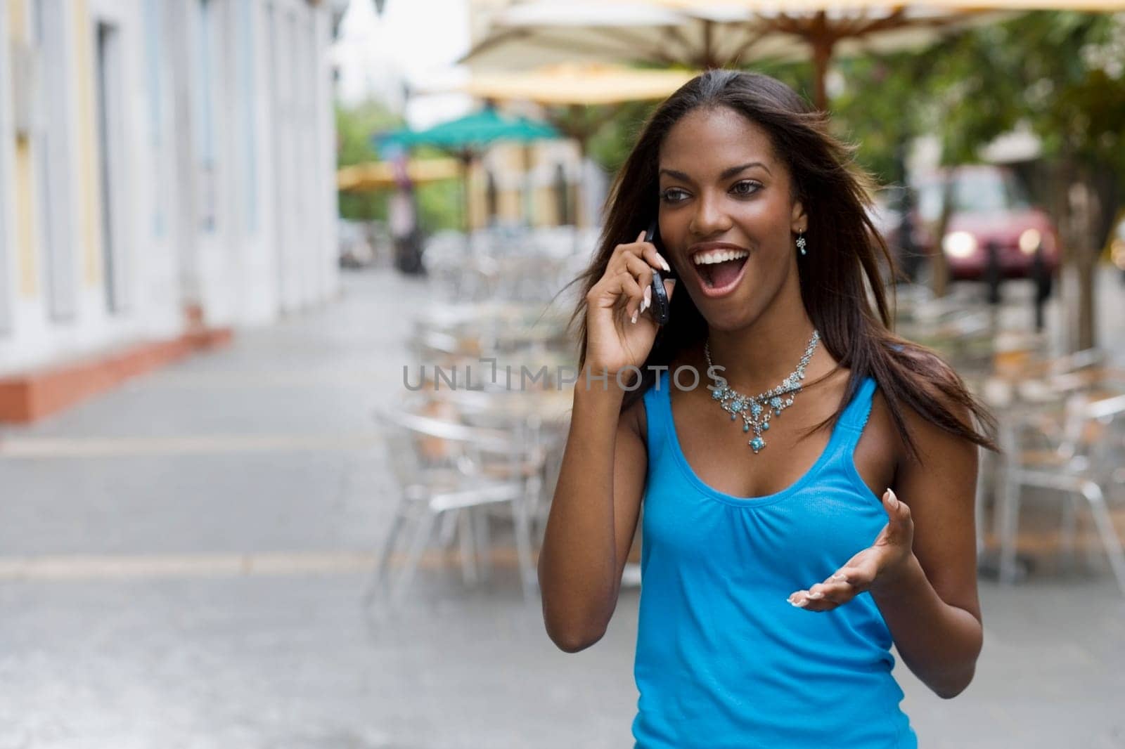 Close-up of a teenage girl talking on a mobile phone