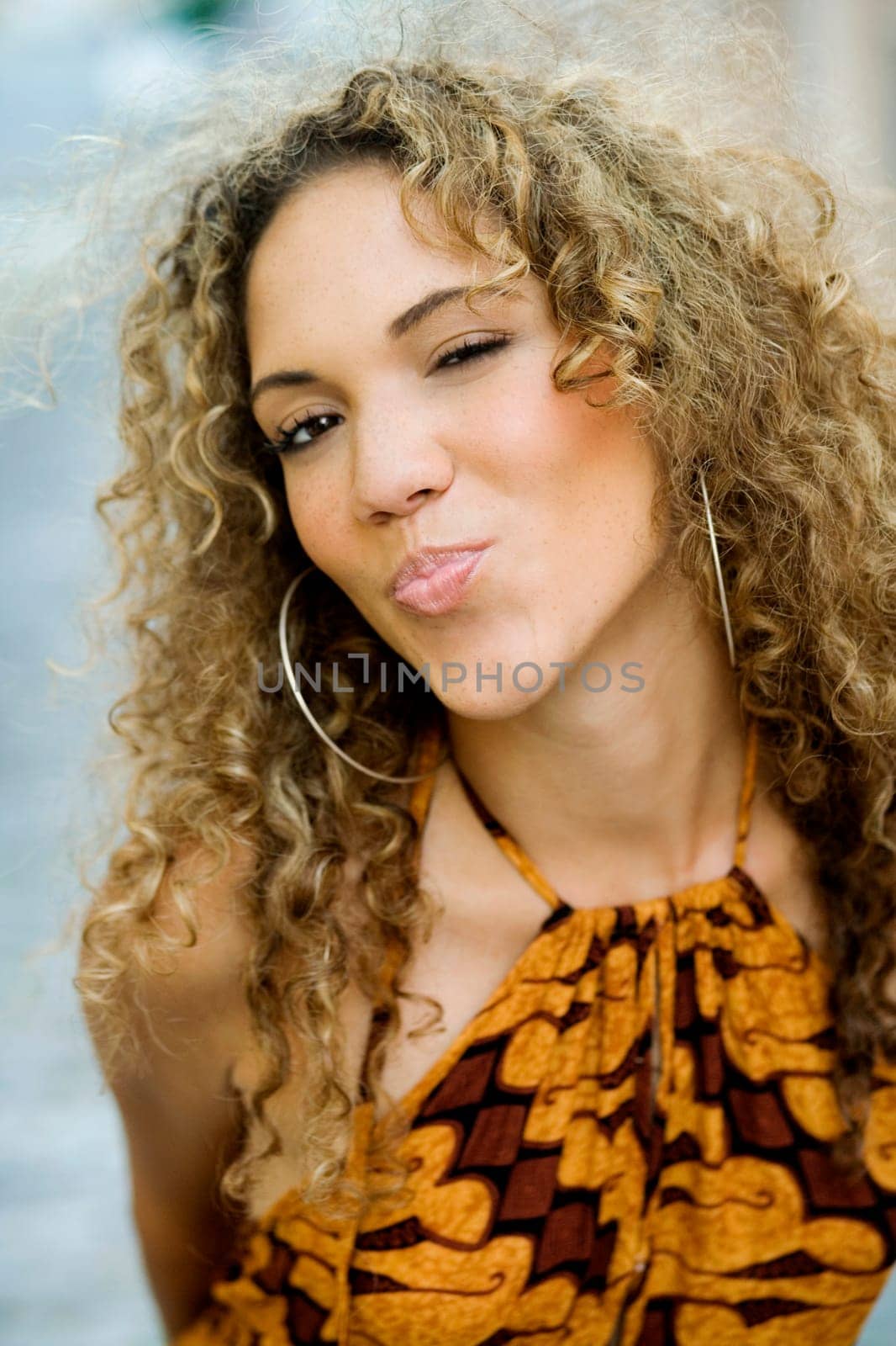 Portrait of a teenage girl puckering her lips