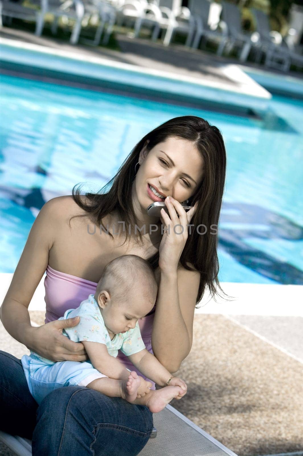 High angle view of a mother sitting with her daughter